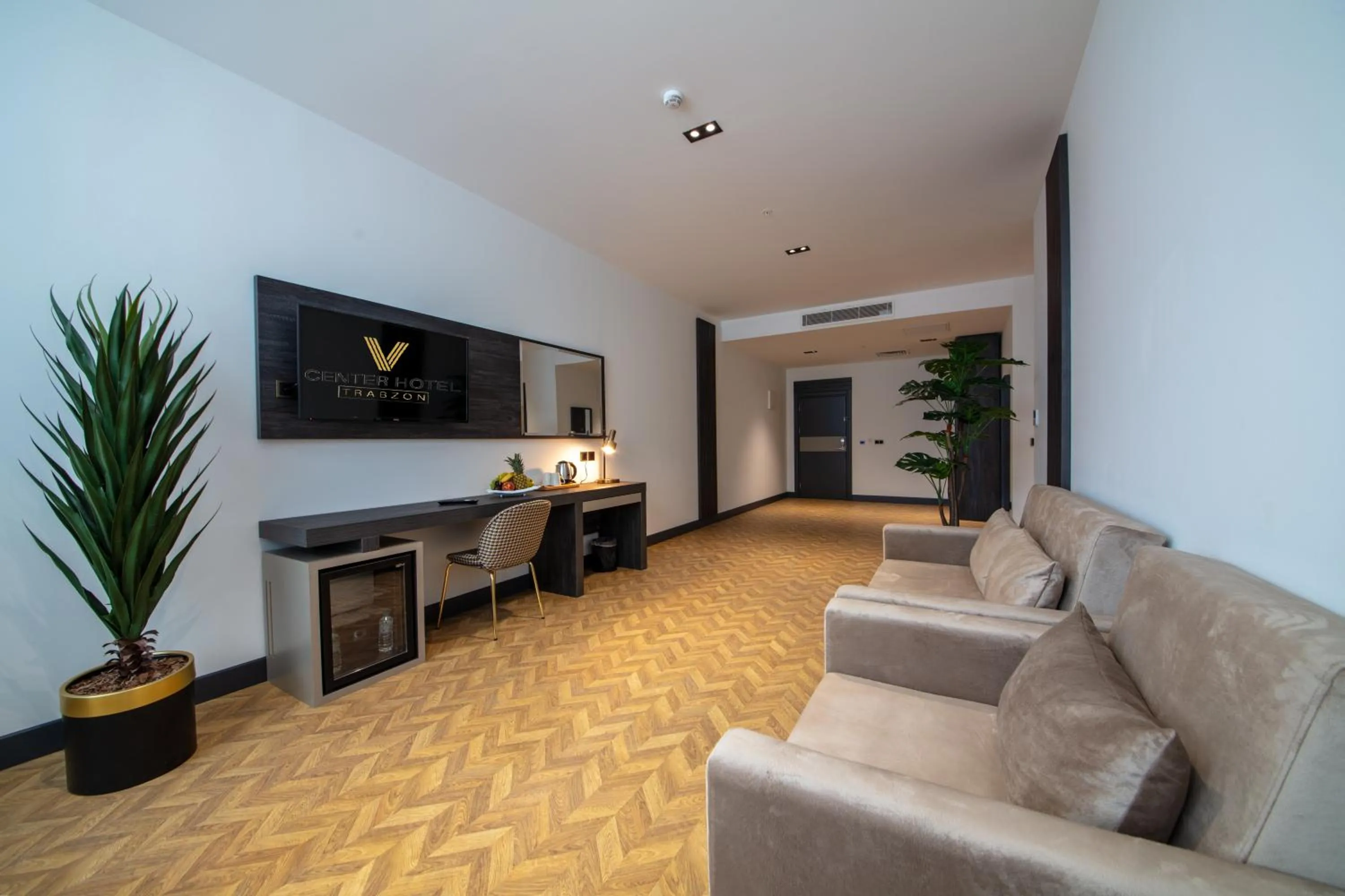 Communal lounge/ TV room in V Center Hotel