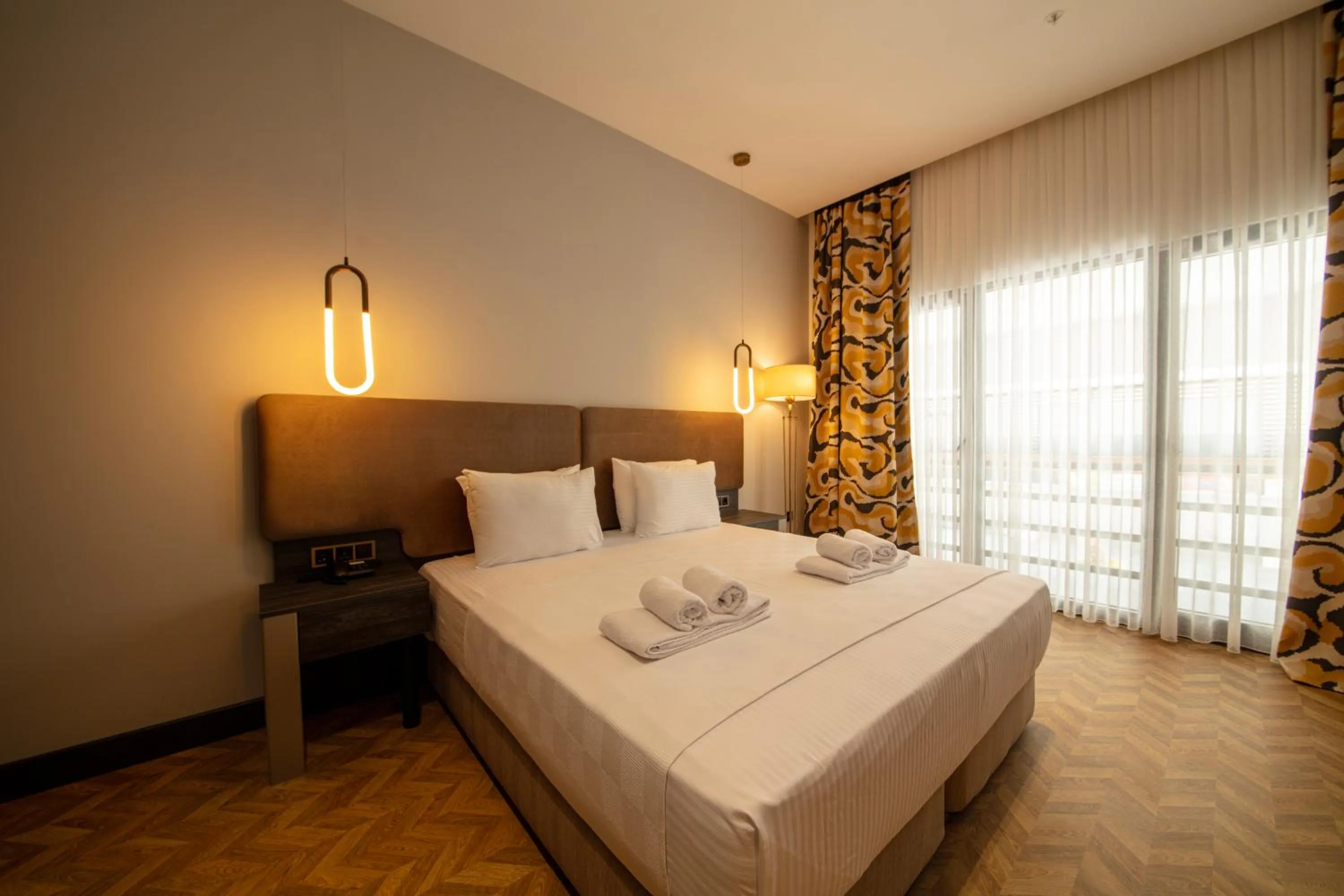 Bed in V Center Hotel