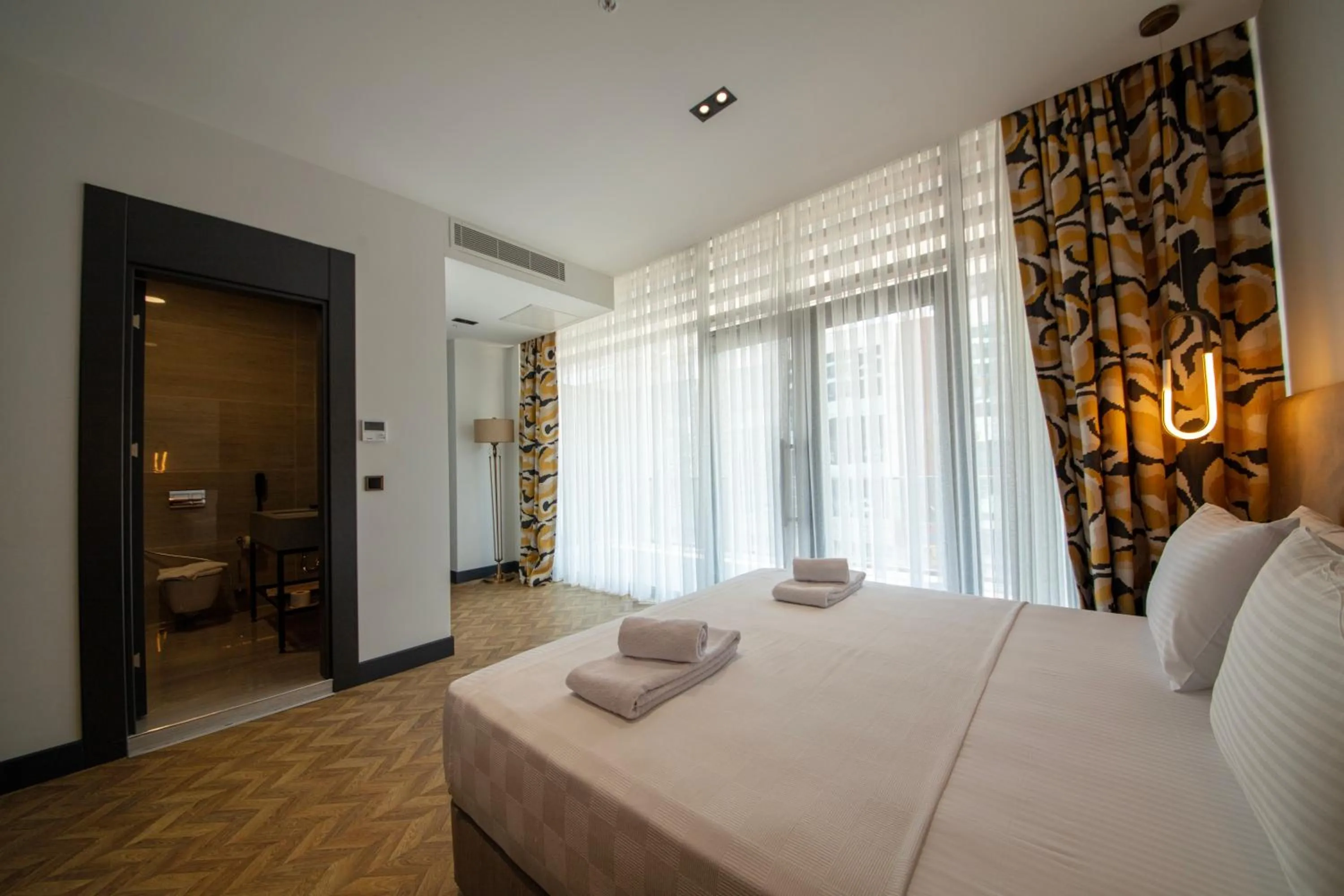 Bed in V Center Hotel