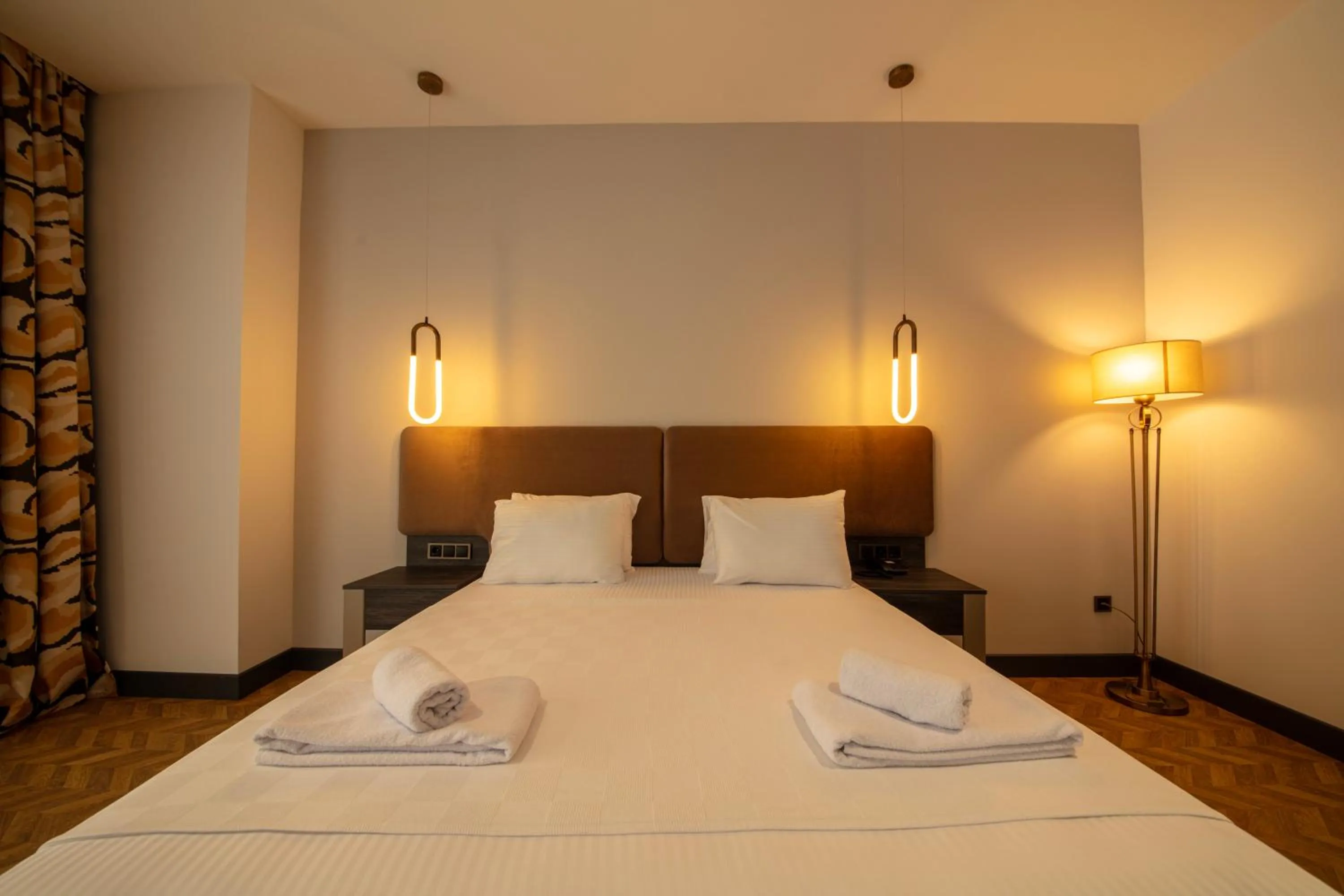 Bed in V Center Hotel