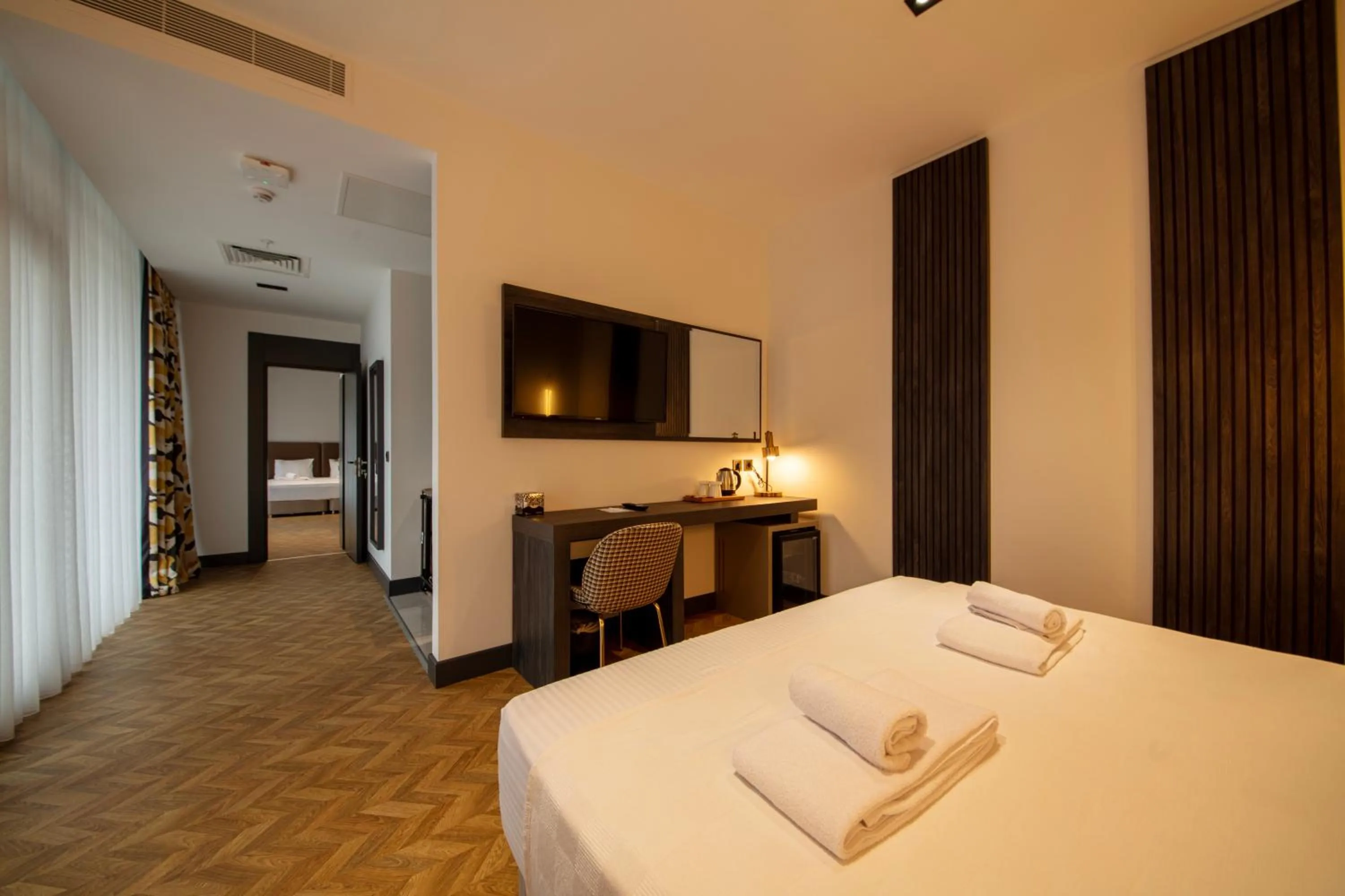 Bed in V Center Hotel