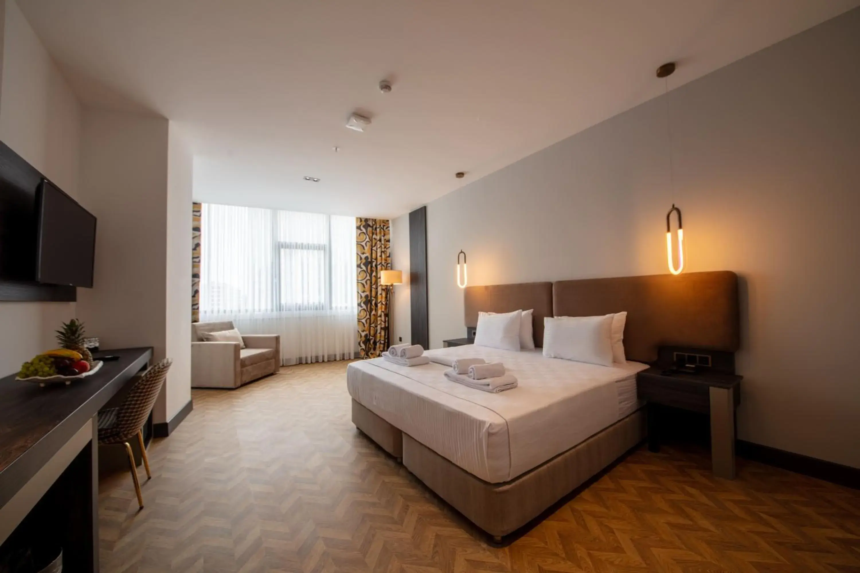 Communal lounge/ TV room, Bed in V Center Hotel Communal lounge/ TV room, Bed in V Center Hotel