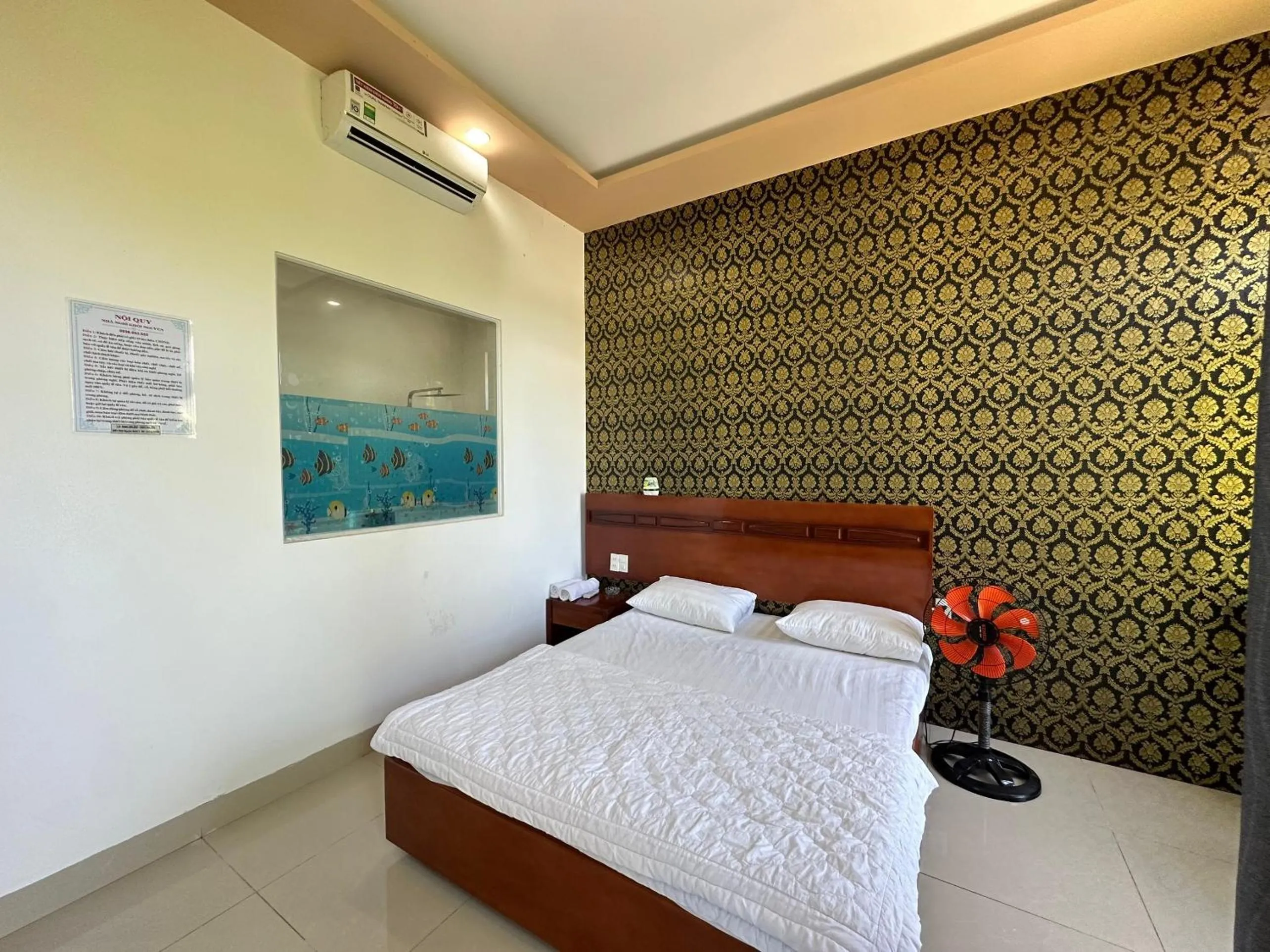 Bedroom in OYO 1191 Happy Motel