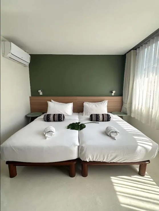 Bed in HOTEL NUU CHIANG MAI