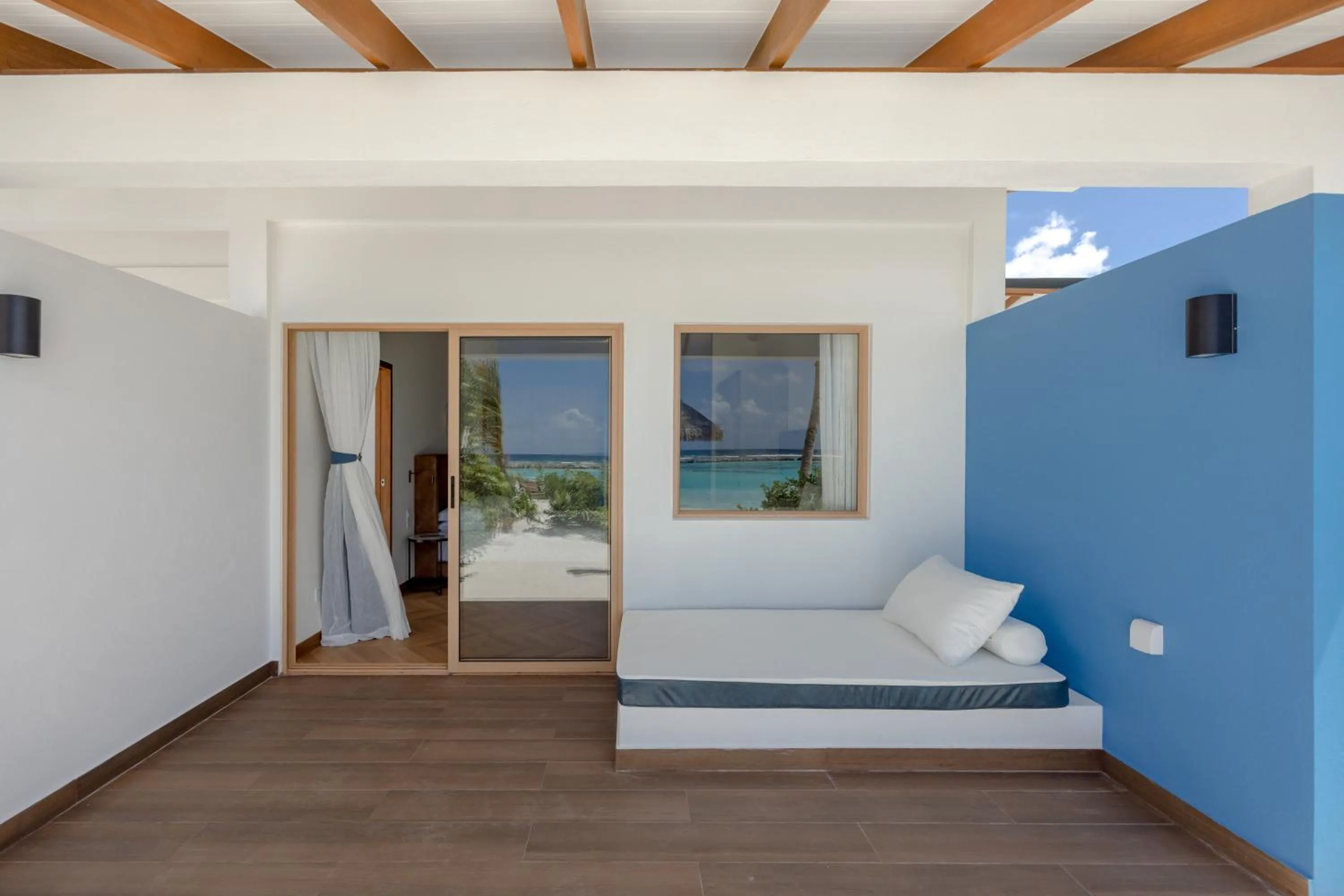 Patio, Bed in Joy Island Maldives All Inclusive Resort
