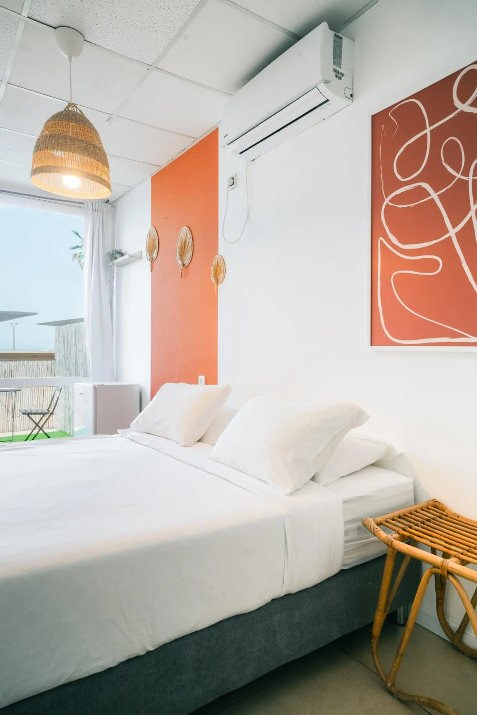 Bed in Central Beach Hotel