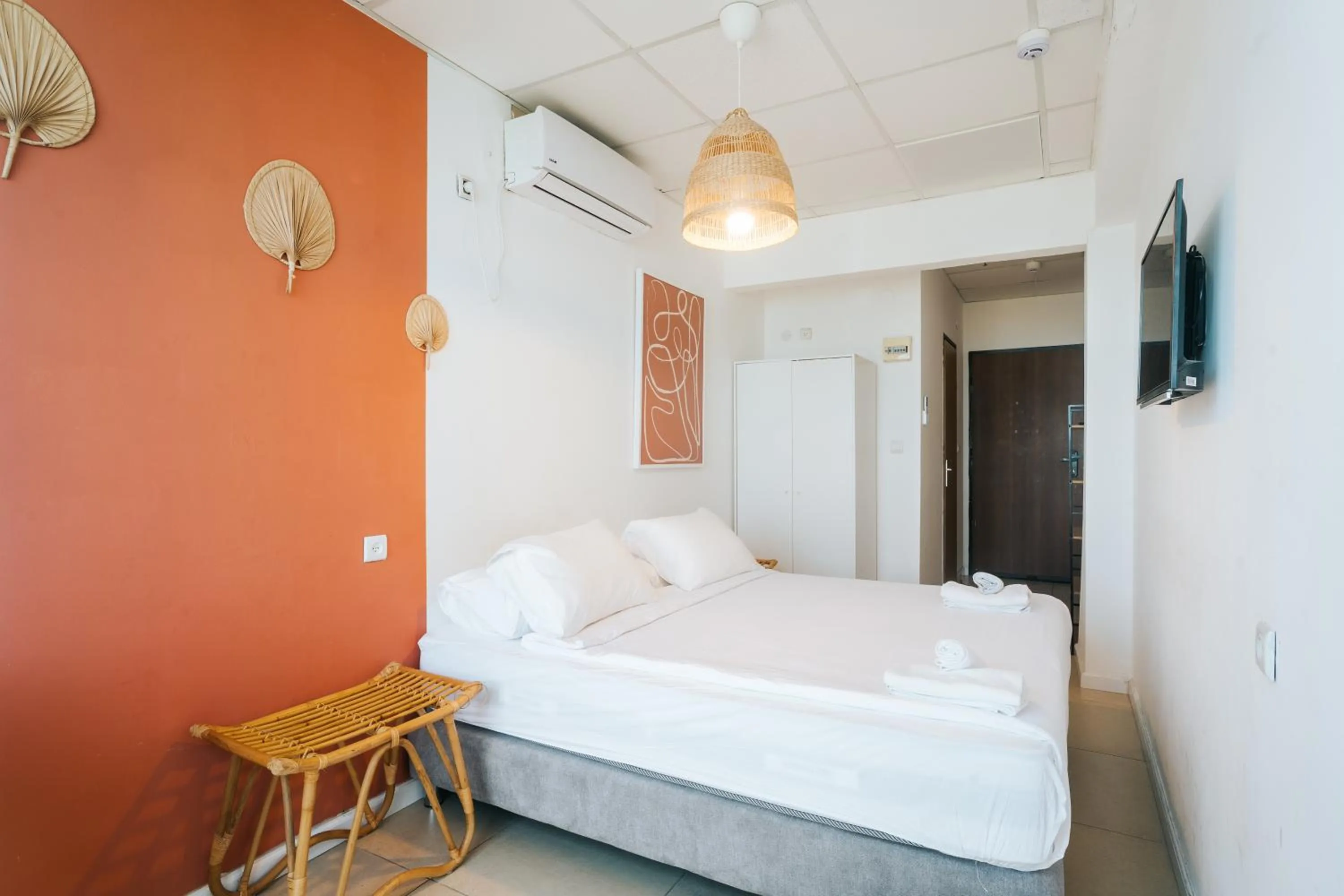 Bed in Central Beach Hotel