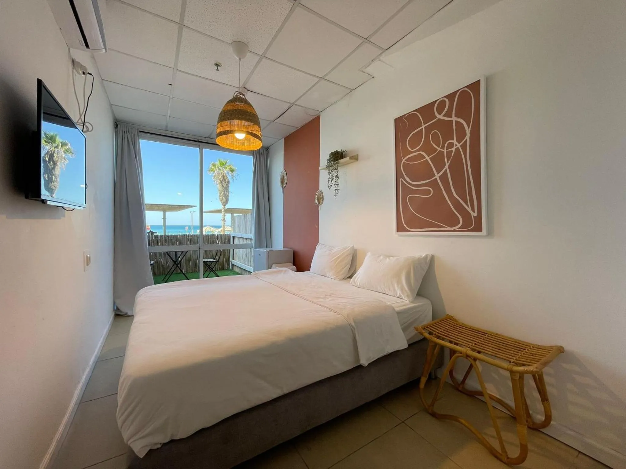 Bed in Central Beach Hotel