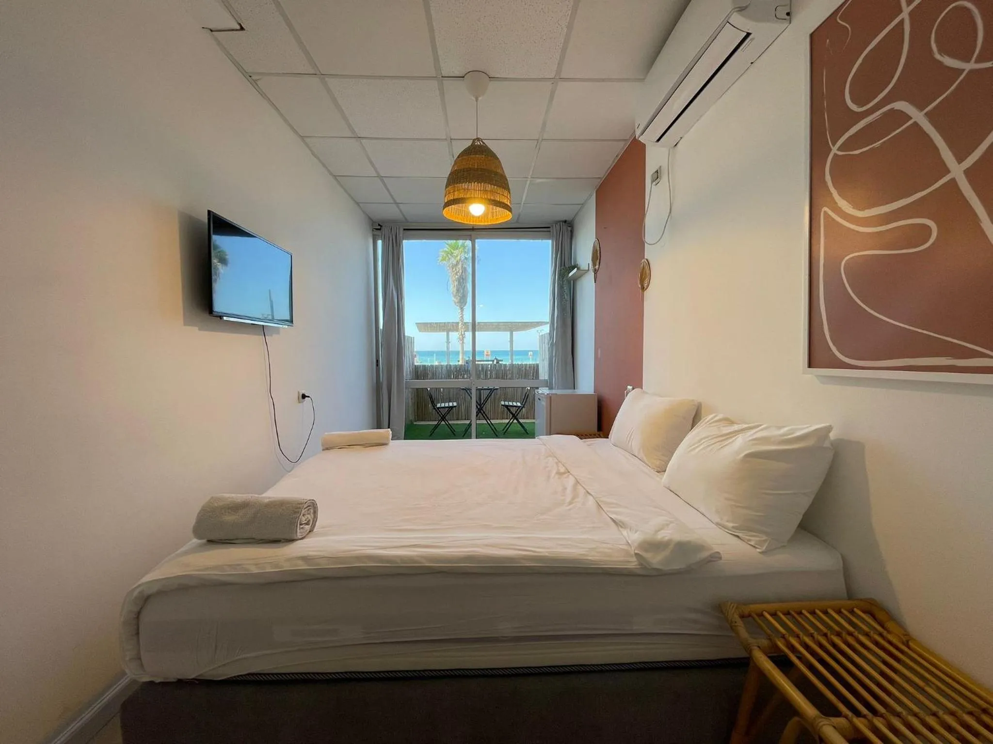 Bed in Central Beach Hotel