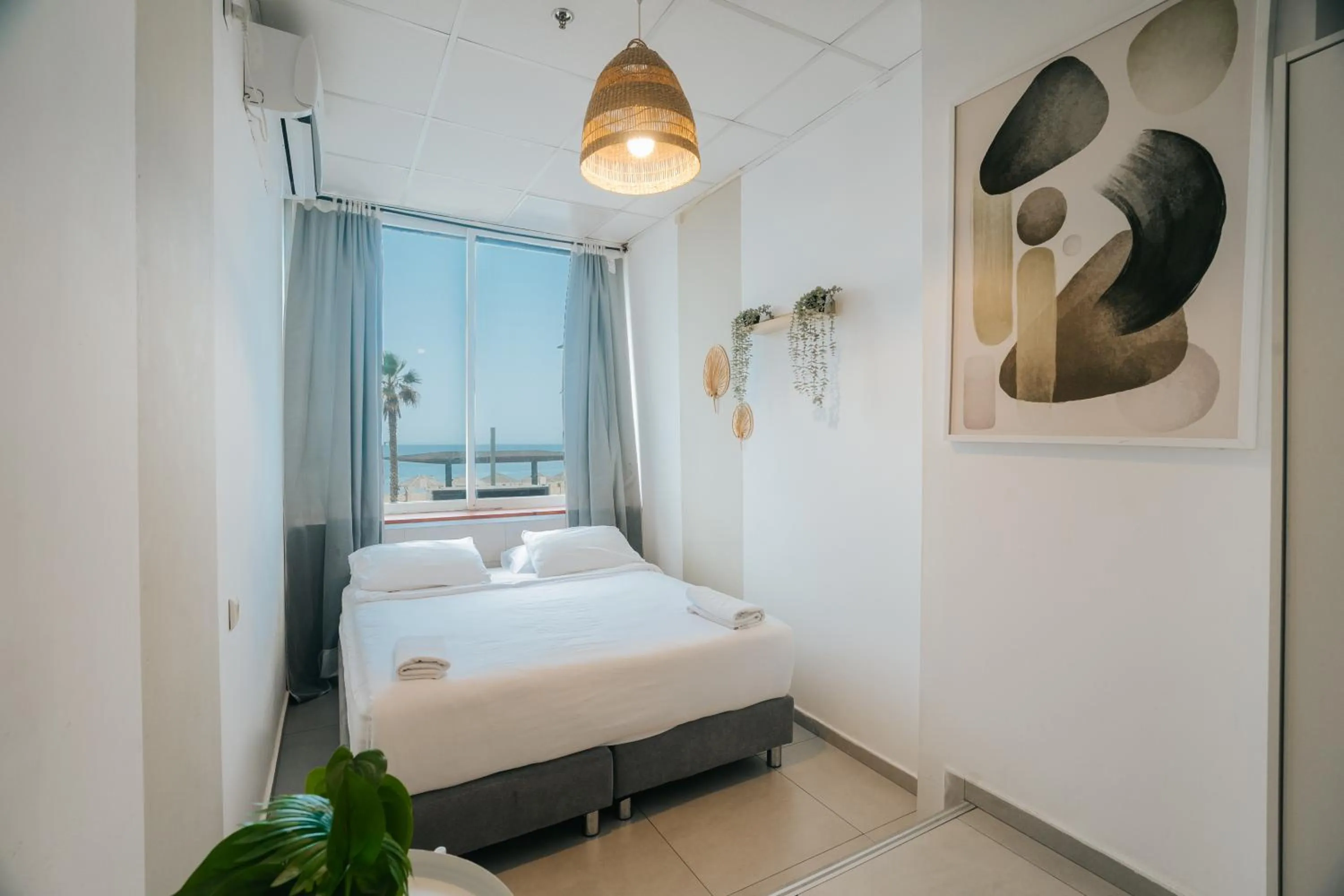 Bed in Central Beach Hotel