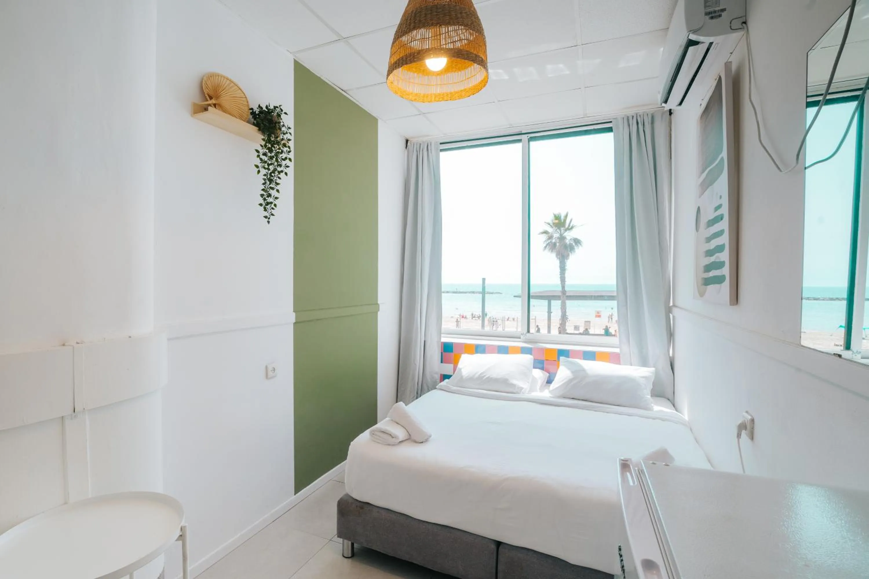 Bed in Central Beach Hotel