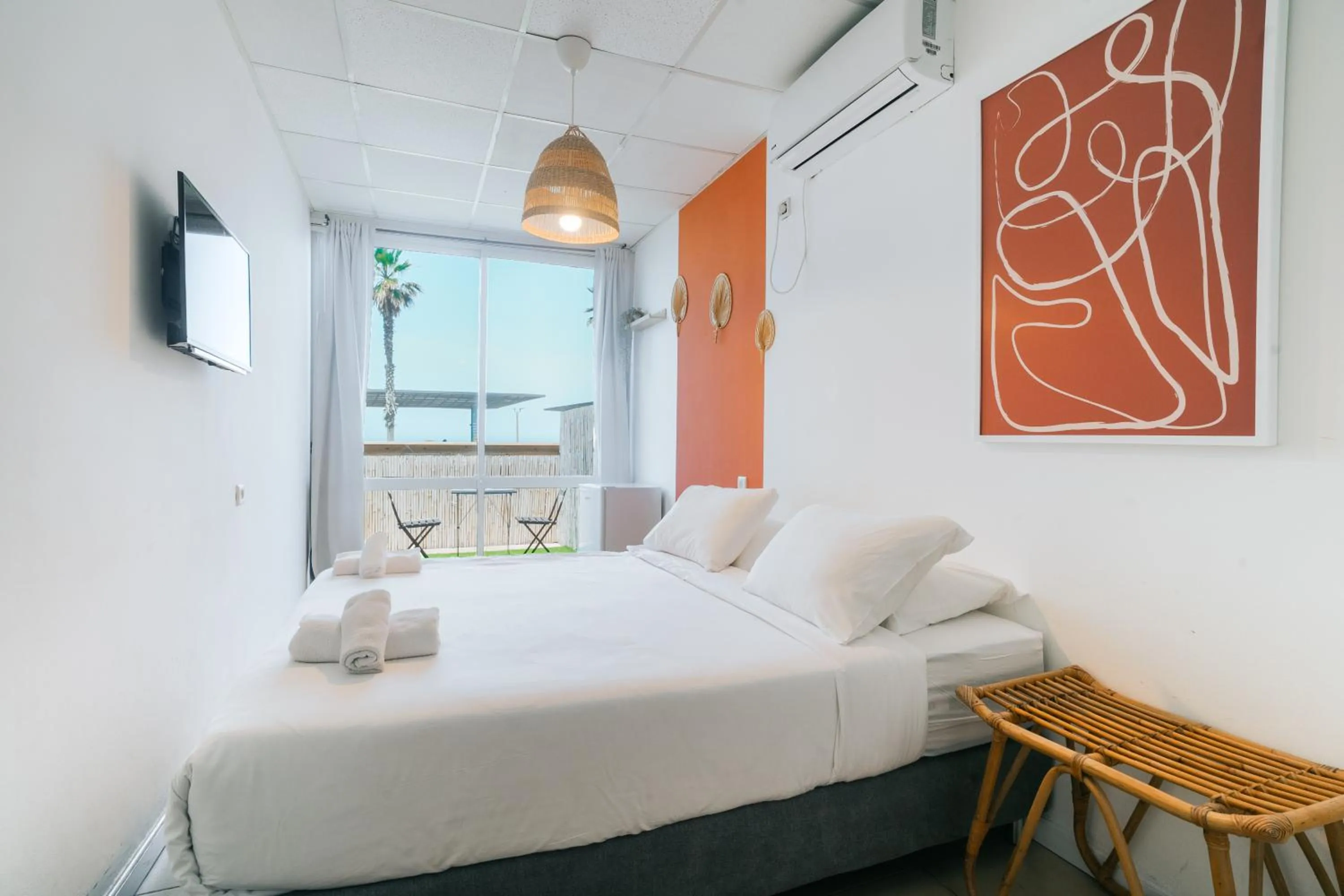 Bed in Central Beach Hotel