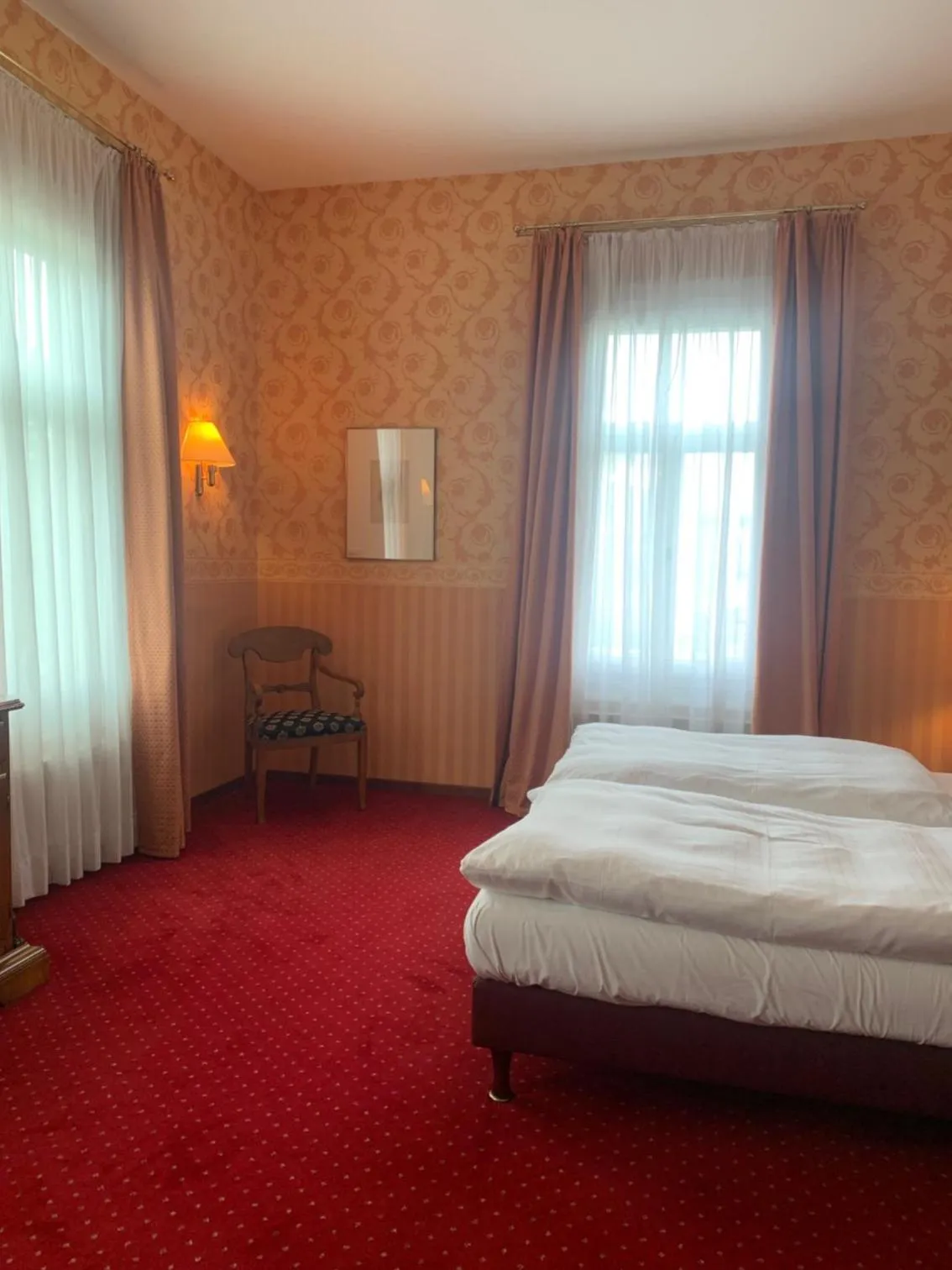 Bed in Hotel Sächsischer Hof