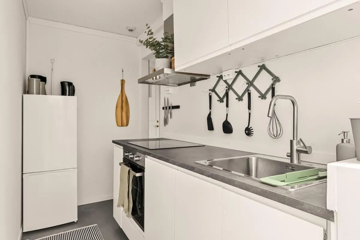 Kitchen or kitchenette in Dinbnb Apartments I Views & Street Parking in Sandviken