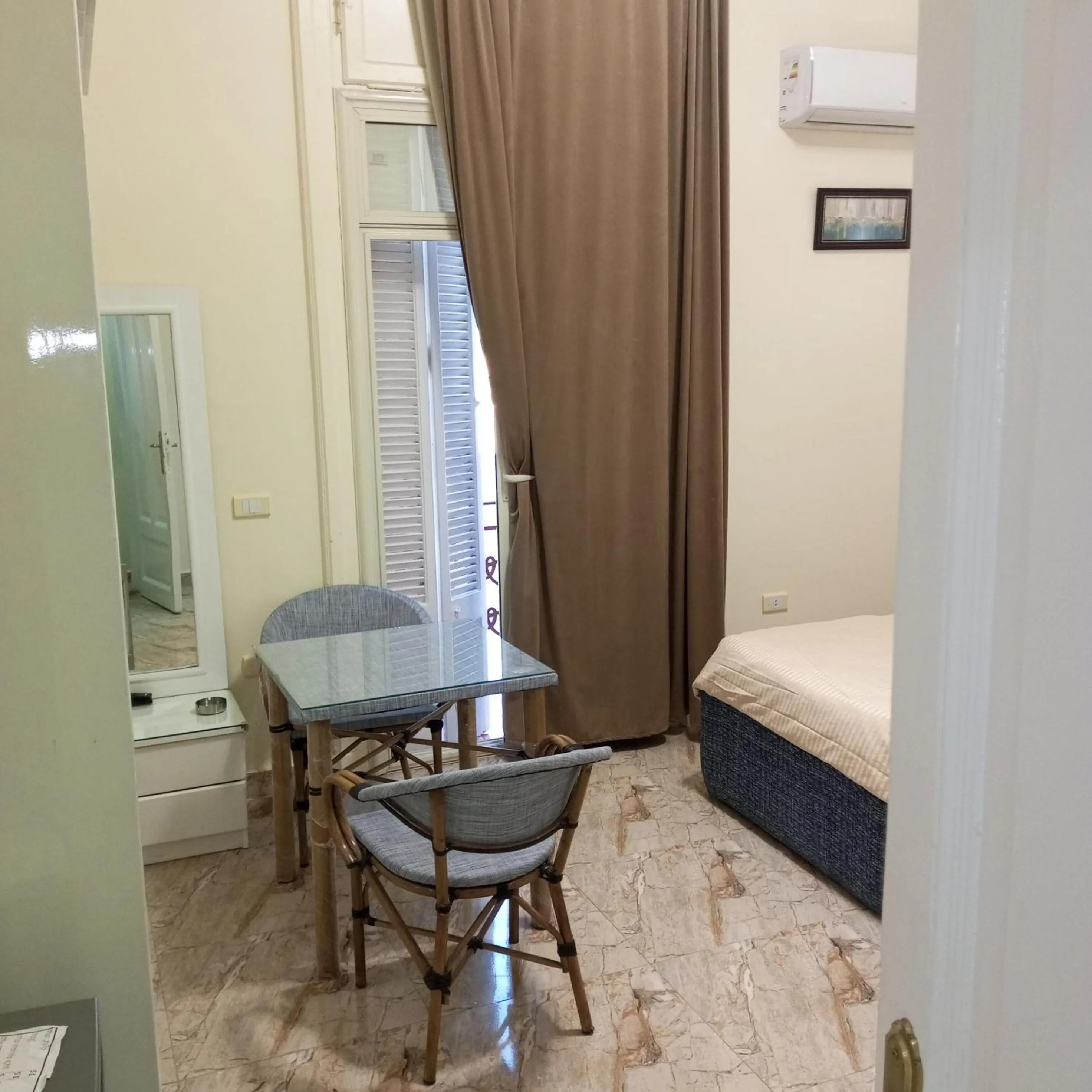 Seating area, Bed in New Panorama Palace