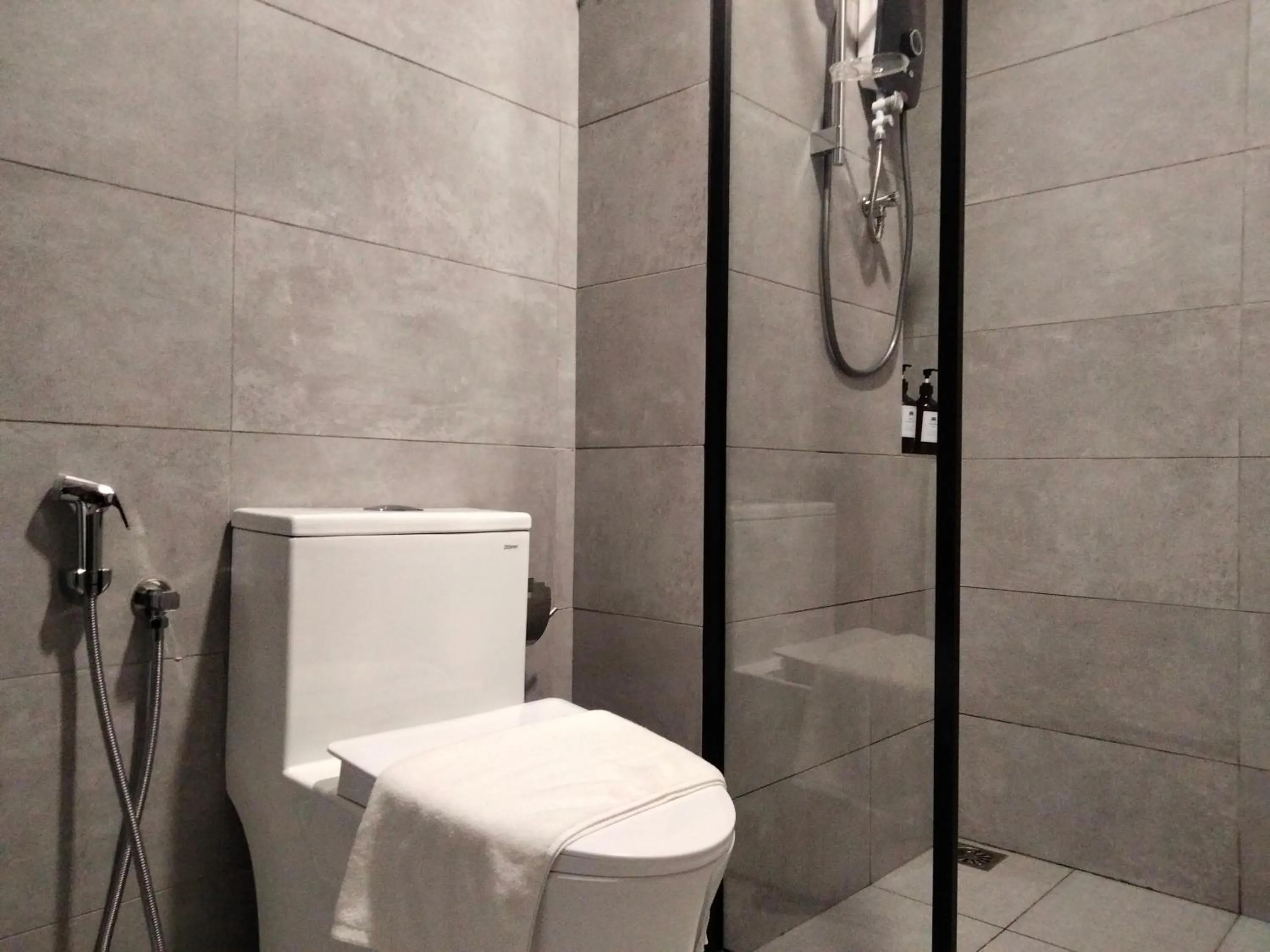 Bathroom in Cubic Botanical Suites Bangsar South by HomeBrickz