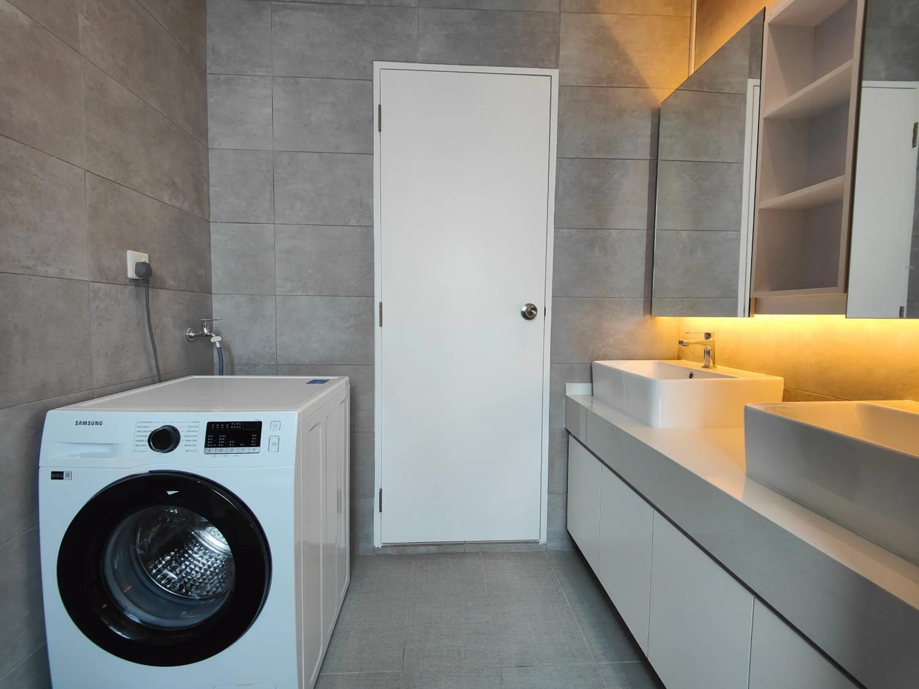 washing machine in Cubic Botanical Suites Bangsar South by HomeBrickz