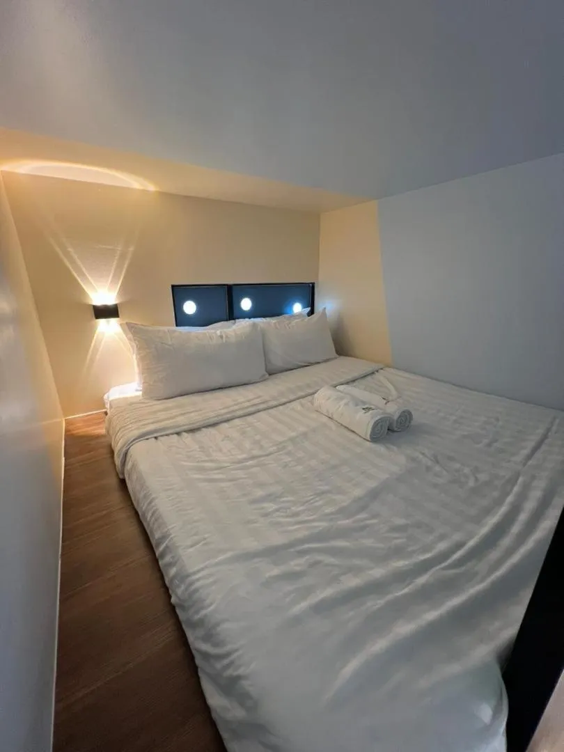 Bed in Cubic Botanical Suites Bangsar South by HomeBrickz