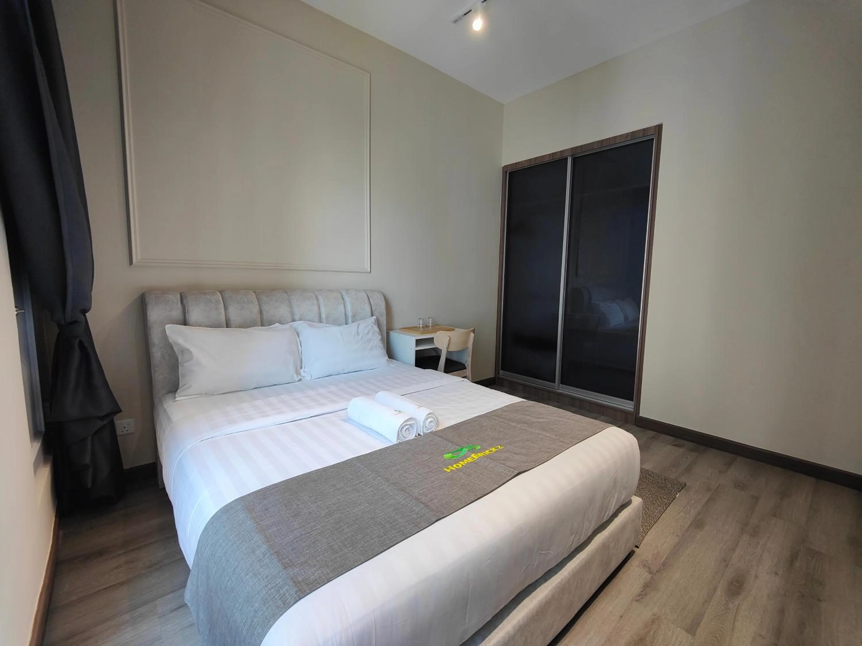Photo of the whole room, Bed in Cubic Botanical Suites Bangsar South by HomeBrickz