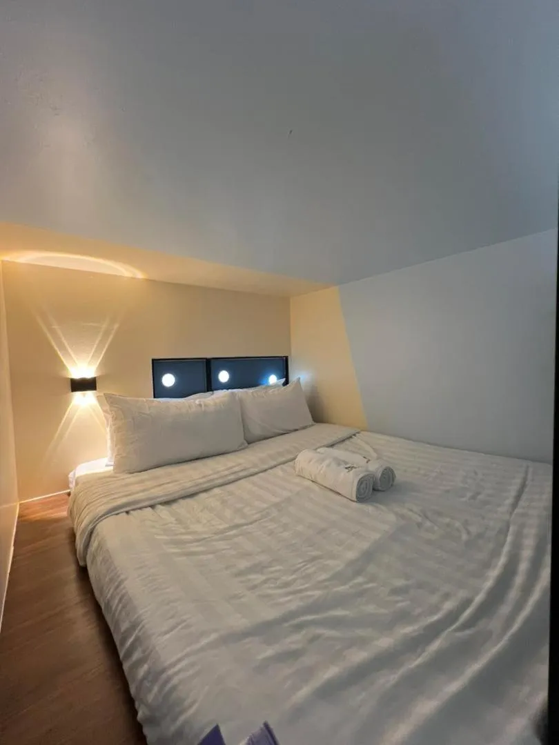 Bed in Cubic Botanical Suites Bangsar South by HomeBrickz