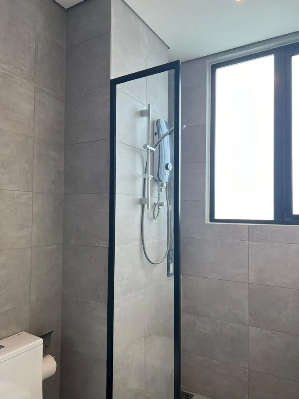 Shower in Cubic Botanical Suites Bangsar South by HomeBrickz