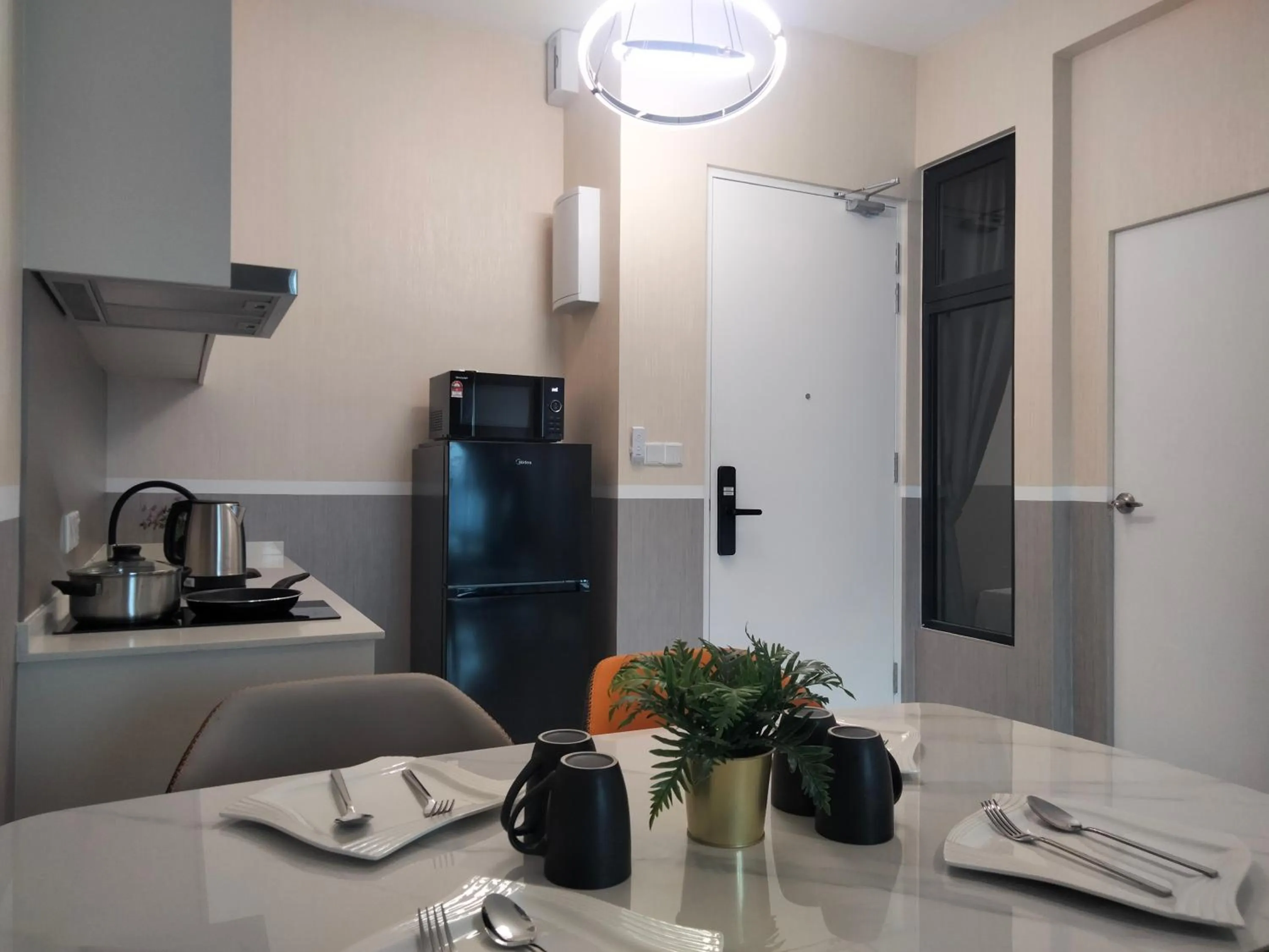 Kitchen or kitchenette in Cubic Botanical Suites Bangsar South by HomeBrickz