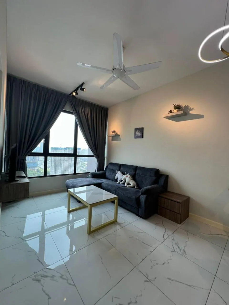 Living room in Cubic Botanical Suites Bangsar South by HomeBrickz