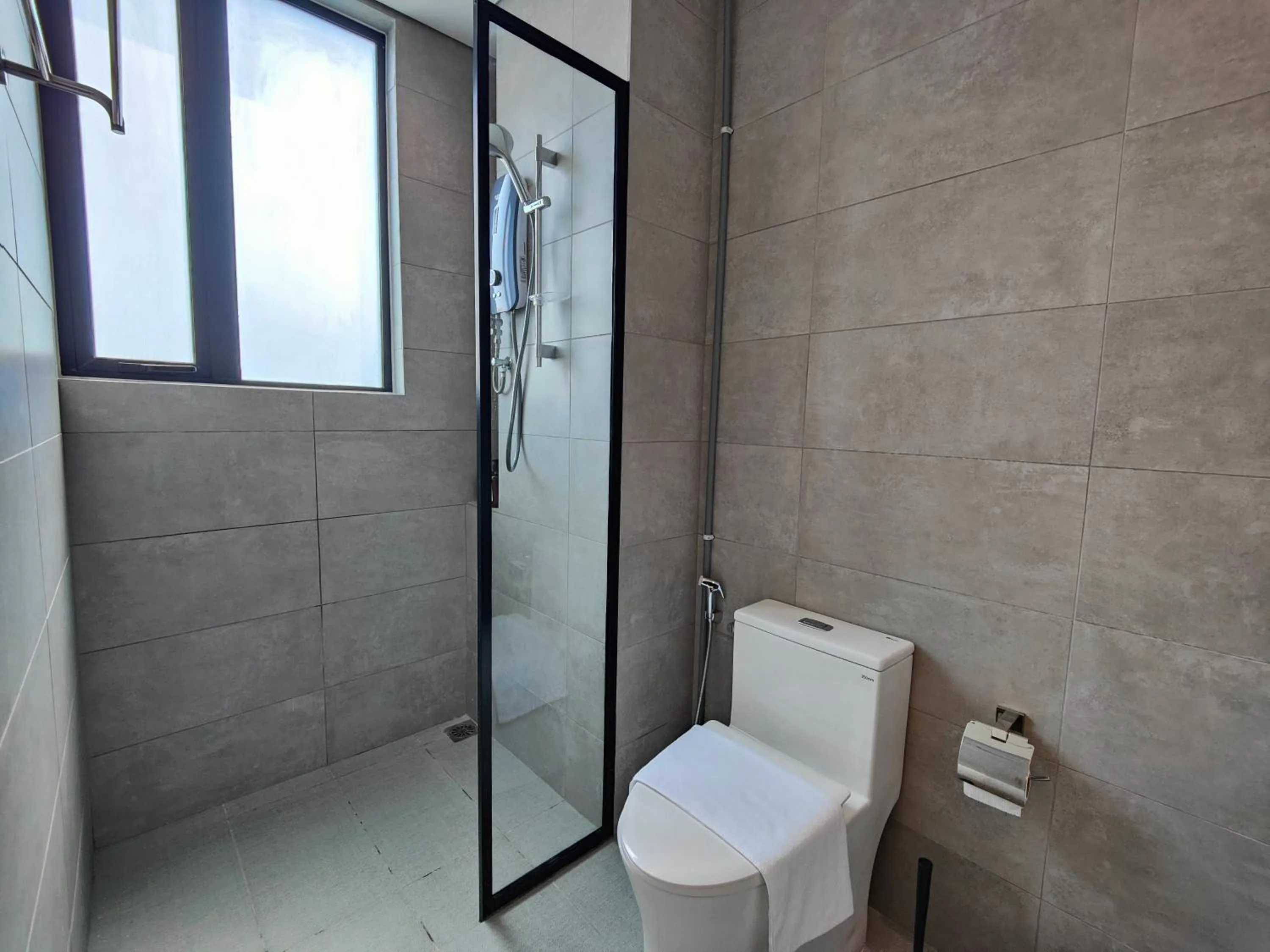 Bathroom in Cubic Botanical Suites Bangsar South by HomeBrickz