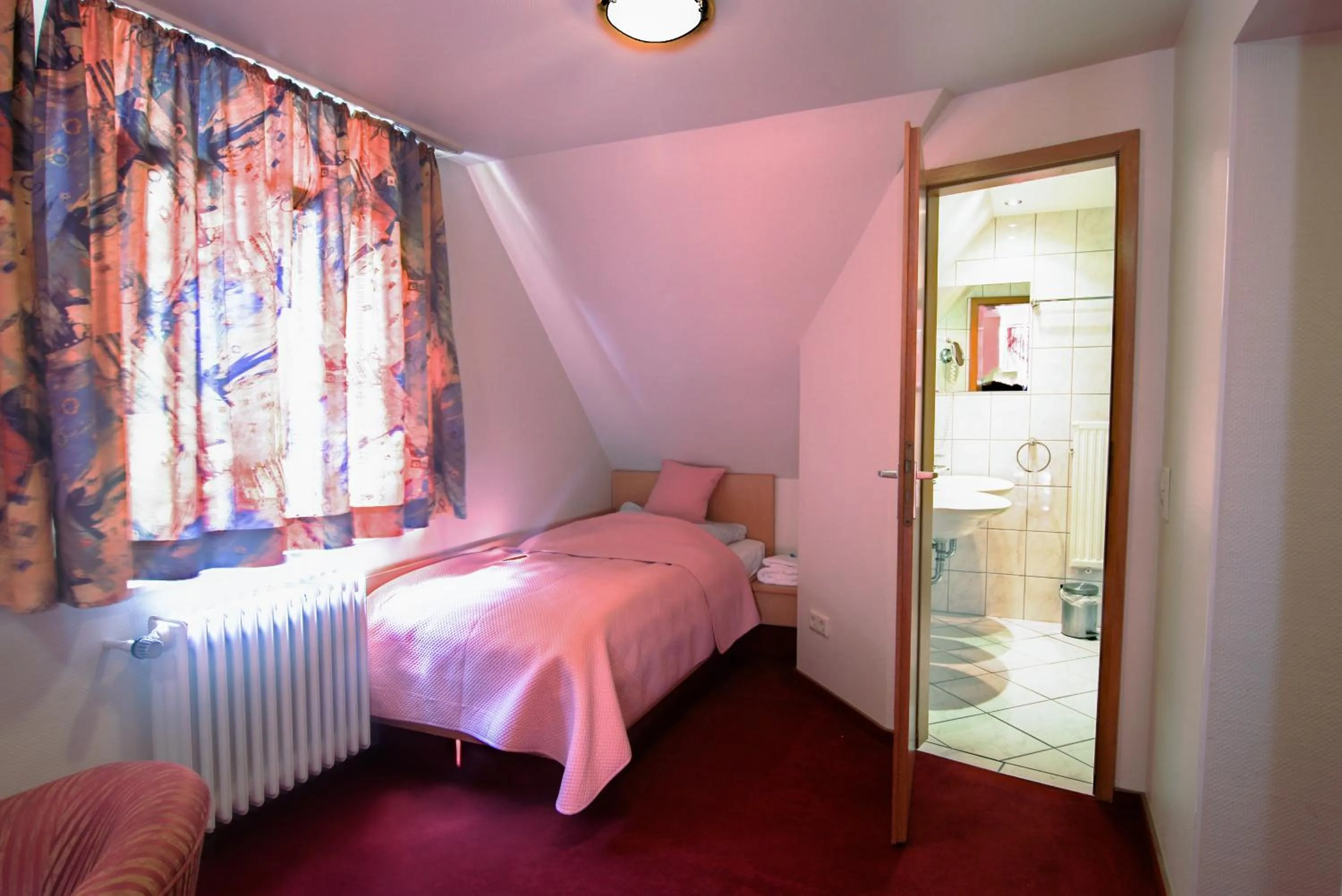 Bed in Hotel Strand-Café