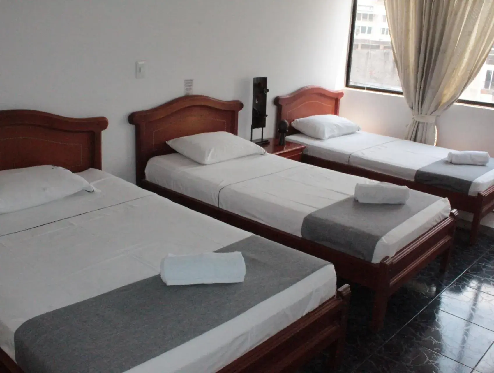 Triple Room in HOTEL DINASTIA REAL NEIVA Triple Room in HOTEL DINASTIA REAL NEIVA