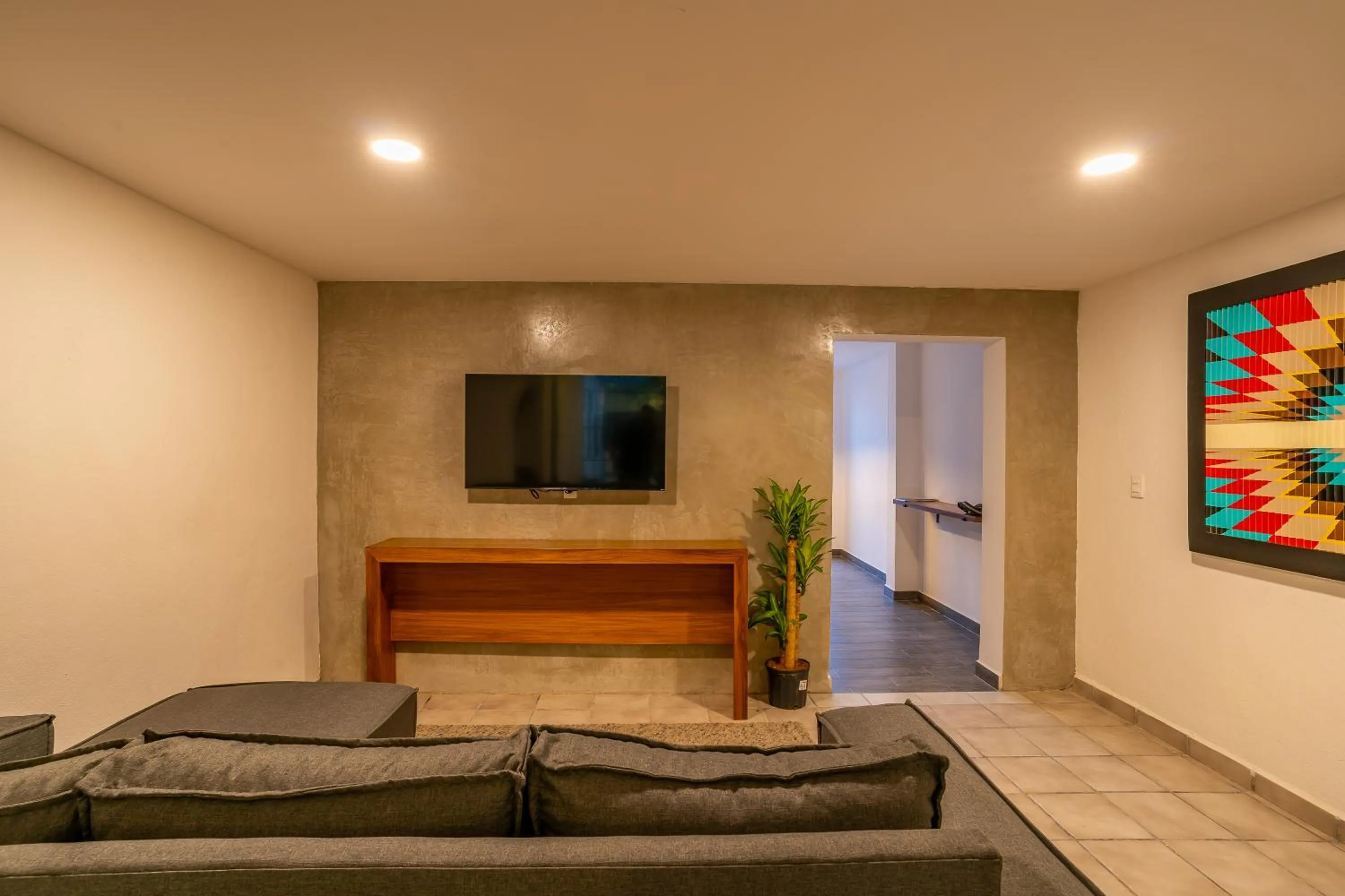 Communal lounge/ TV room in Casa Madero La Paz