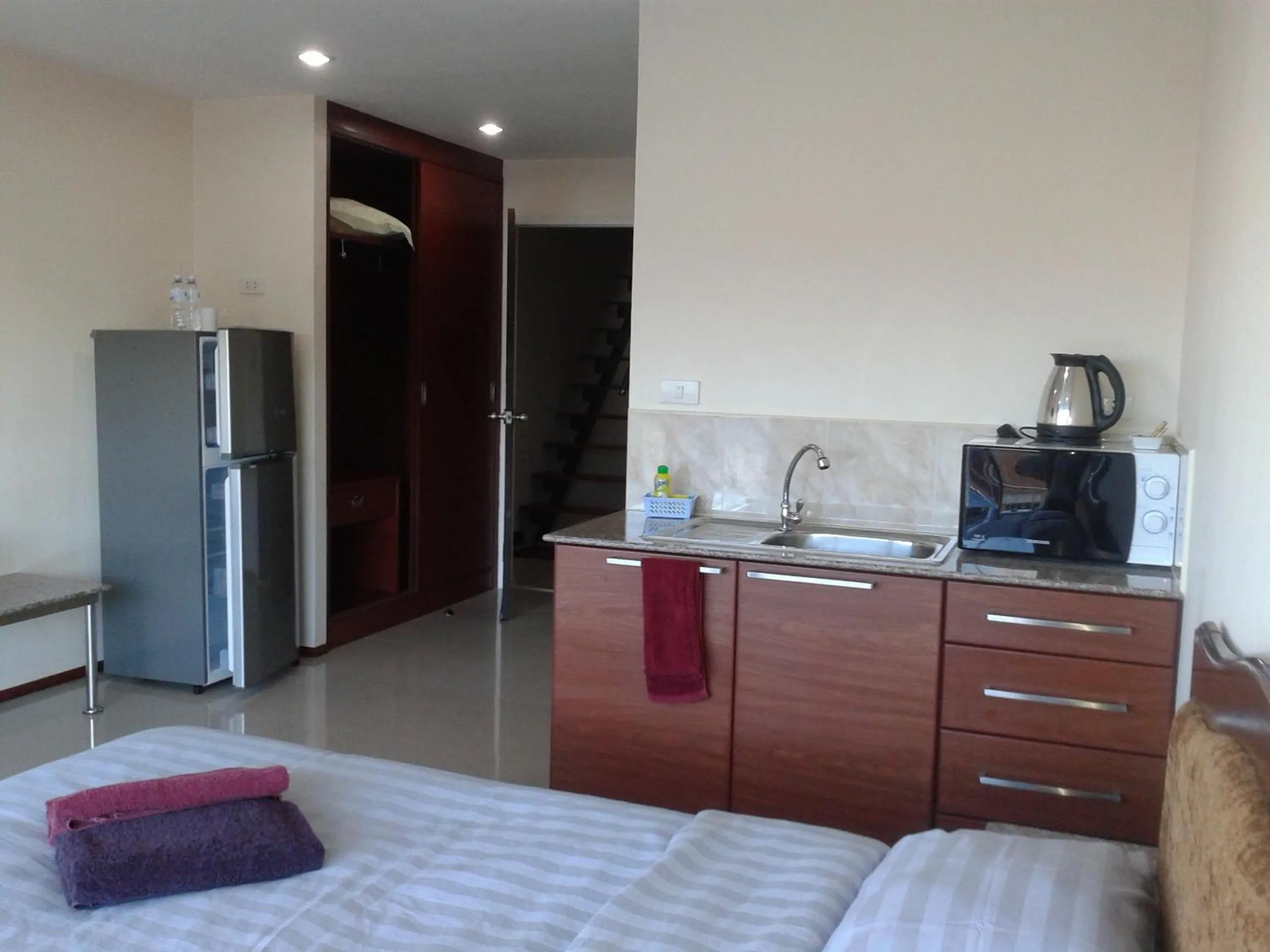 Kitchen or kitchenette, Bed in Dream Boutique Hotel