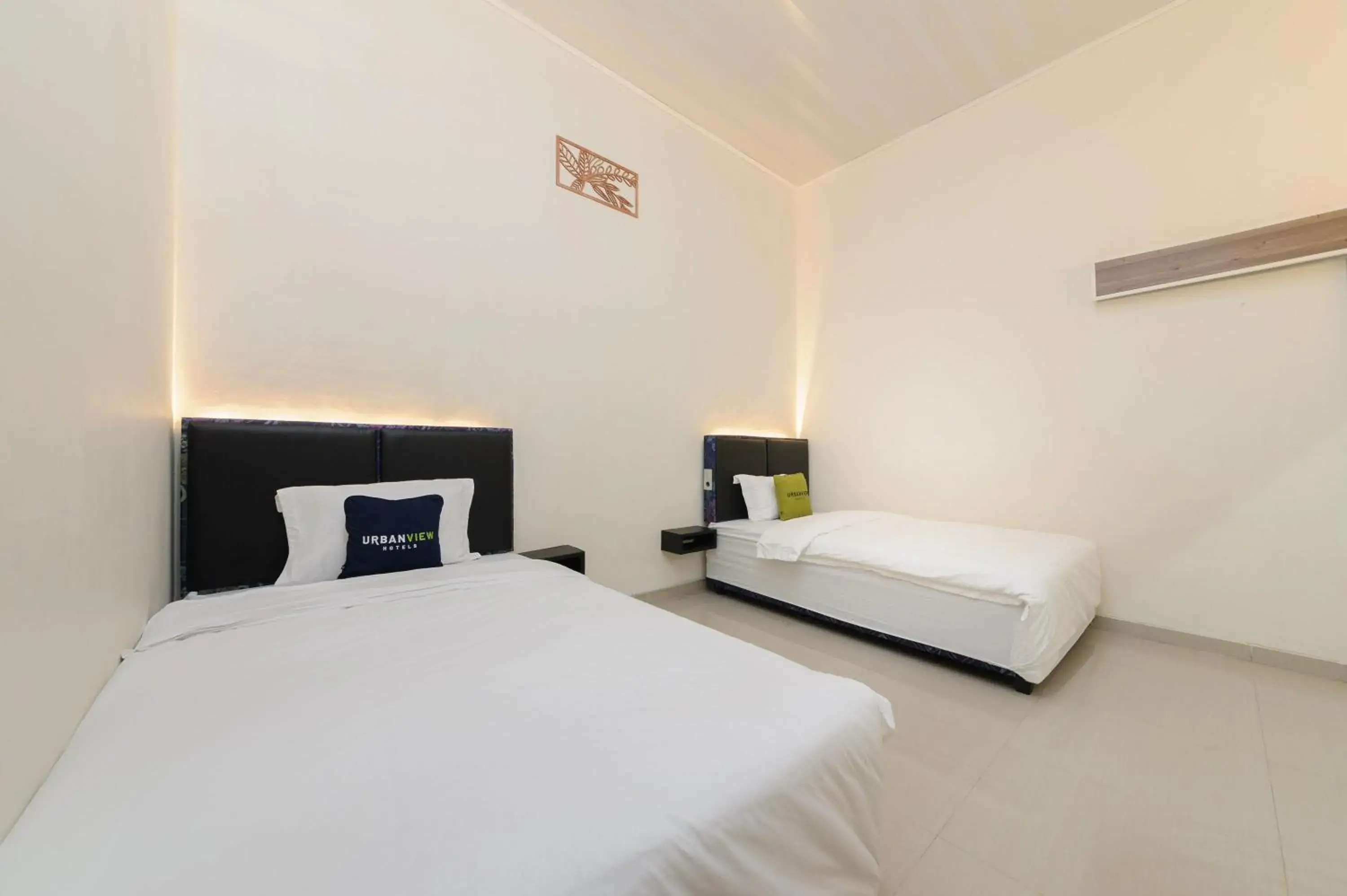 Bed in Urbanview Hotel Binwa Syariah Lampung by RedDoorz Bed in Urbanview Hotel Binwa Syariah Lampung by RedDoorz