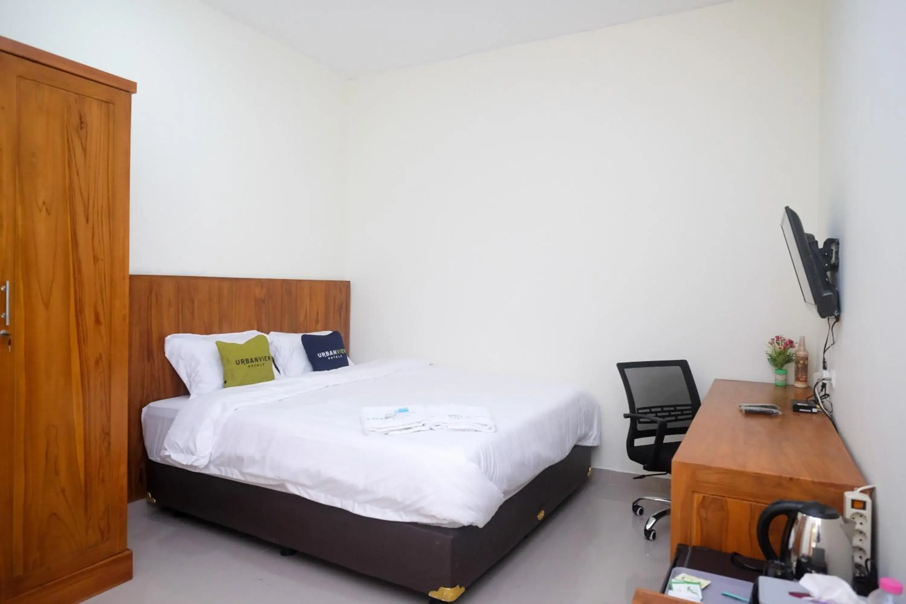 Bed in Urbanview Syariah Kadarman Home Laweyan by RedDoorz Bed in Urbanview Syariah Kadarman Home Laweyan by RedDoorz