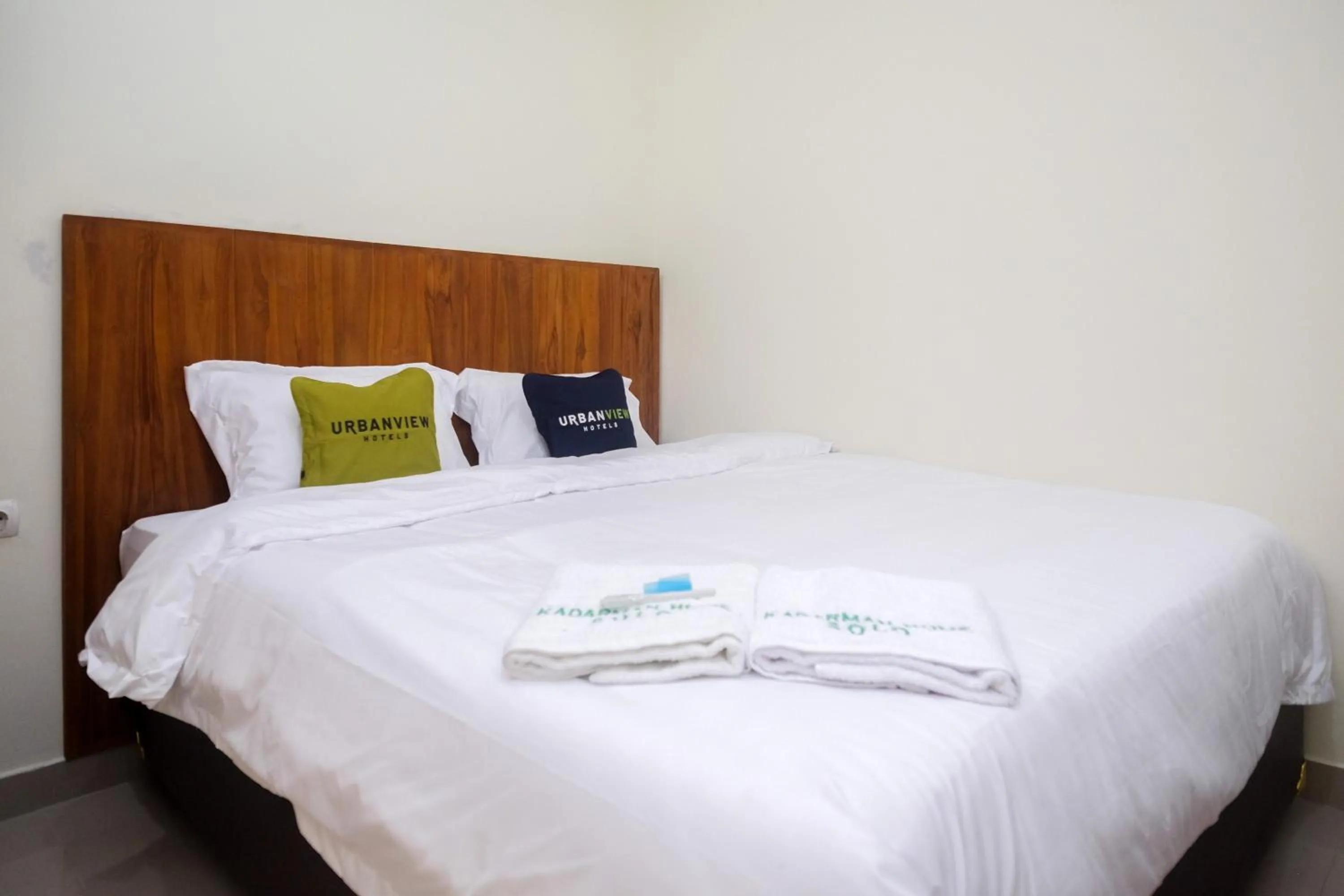 Bed in Urbanview Syariah Kadarman Home Laweyan by RedDoorz