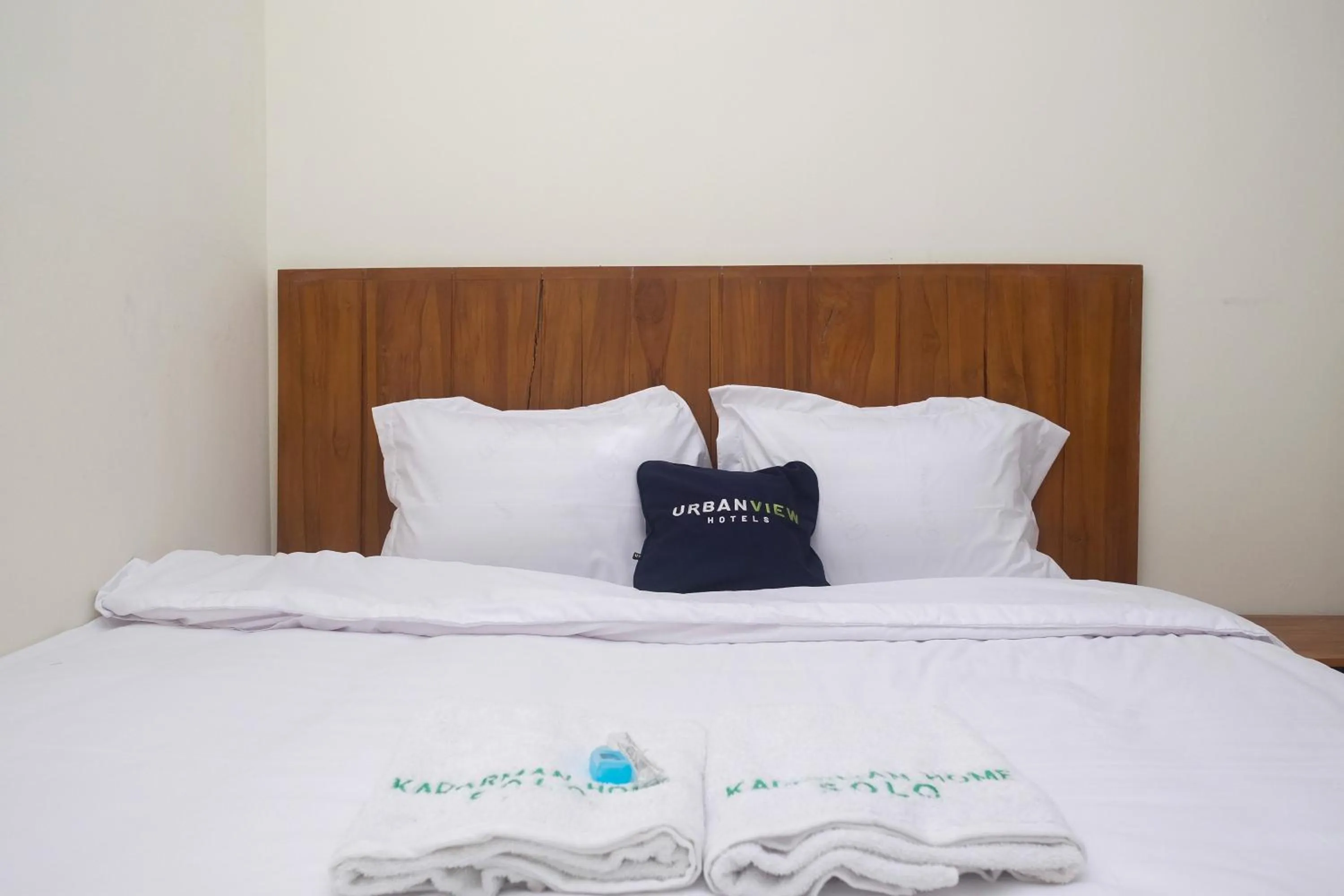 Bed in Urbanview Syariah Kadarman Home Laweyan by RedDoorz