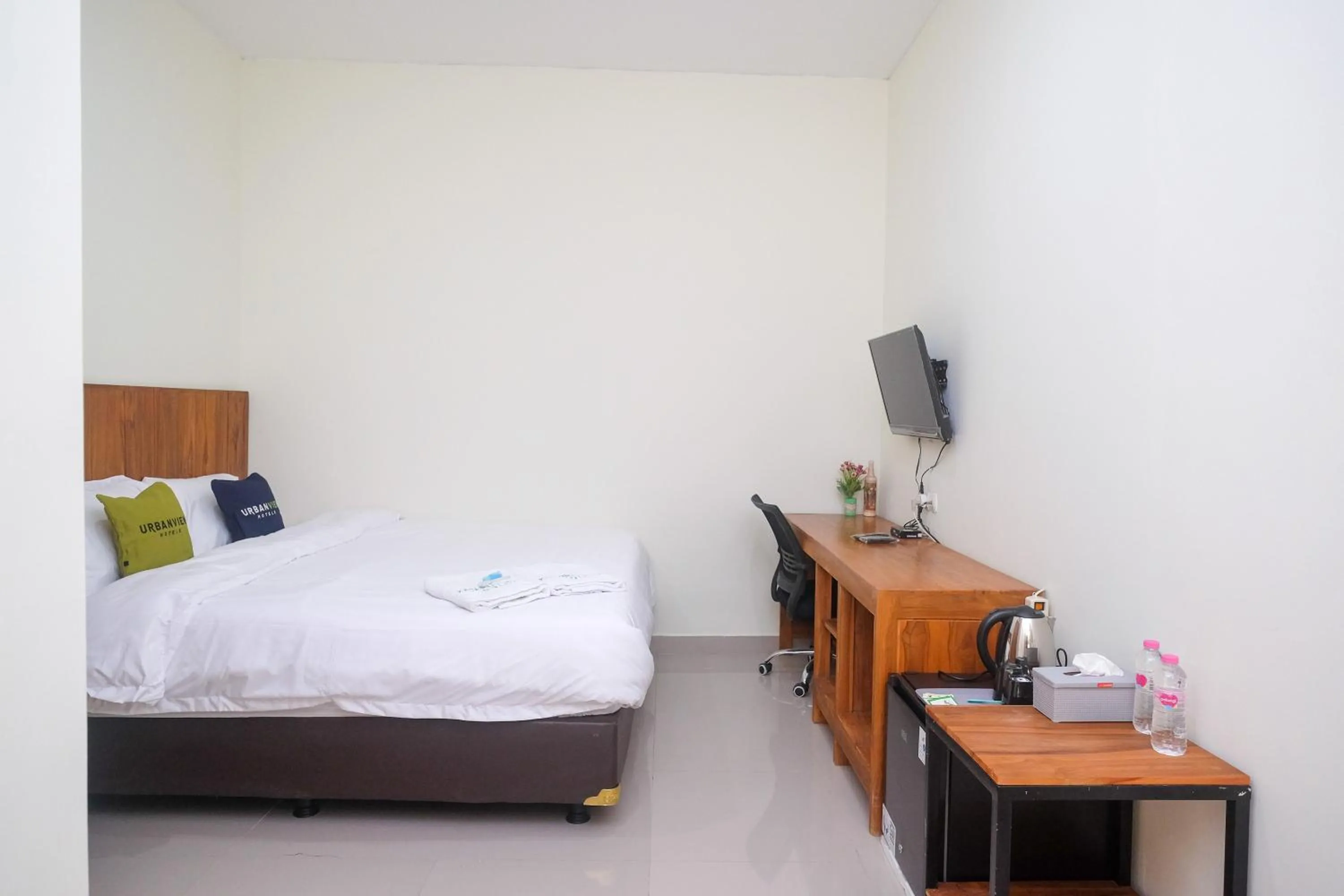 Bed in Urbanview Syariah Kadarman Home Laweyan by RedDoorz