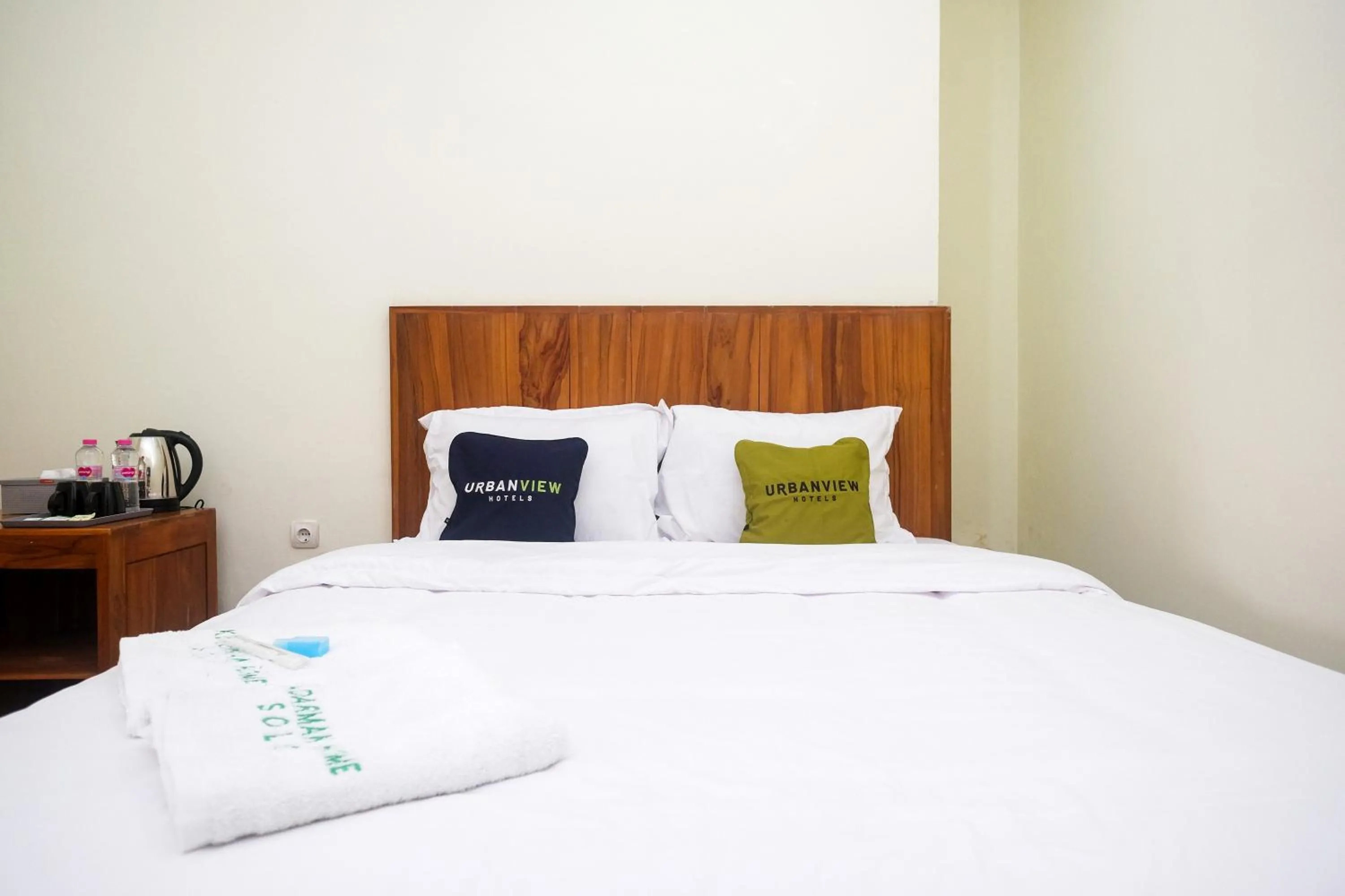 Bed in Urbanview Syariah Kadarman Home Laweyan by RedDoorz