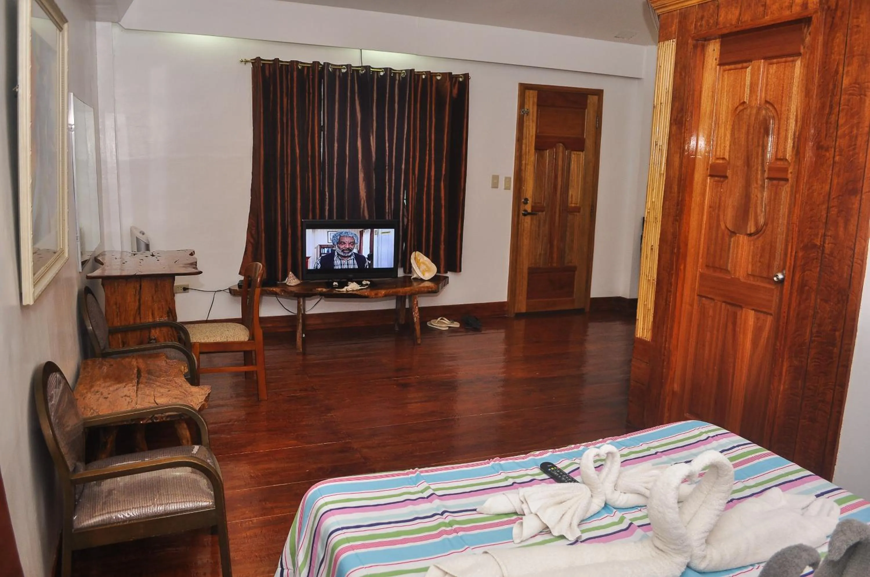 Photo of the whole room, Bed in Cocoloco Beach Resort
