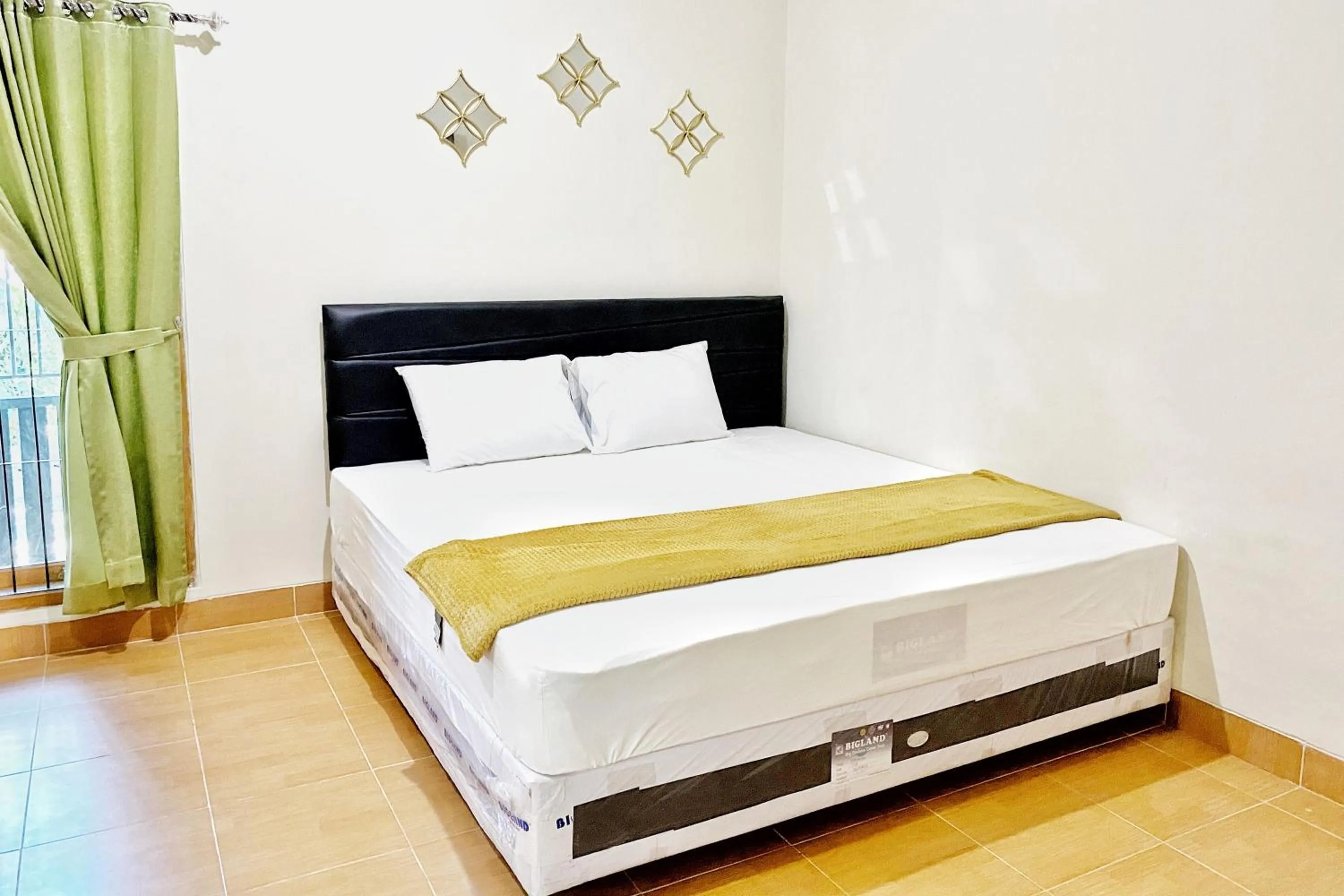 Adipura Guesthouse Syariah Mitra RedDoorz near Terminal Nganjuk