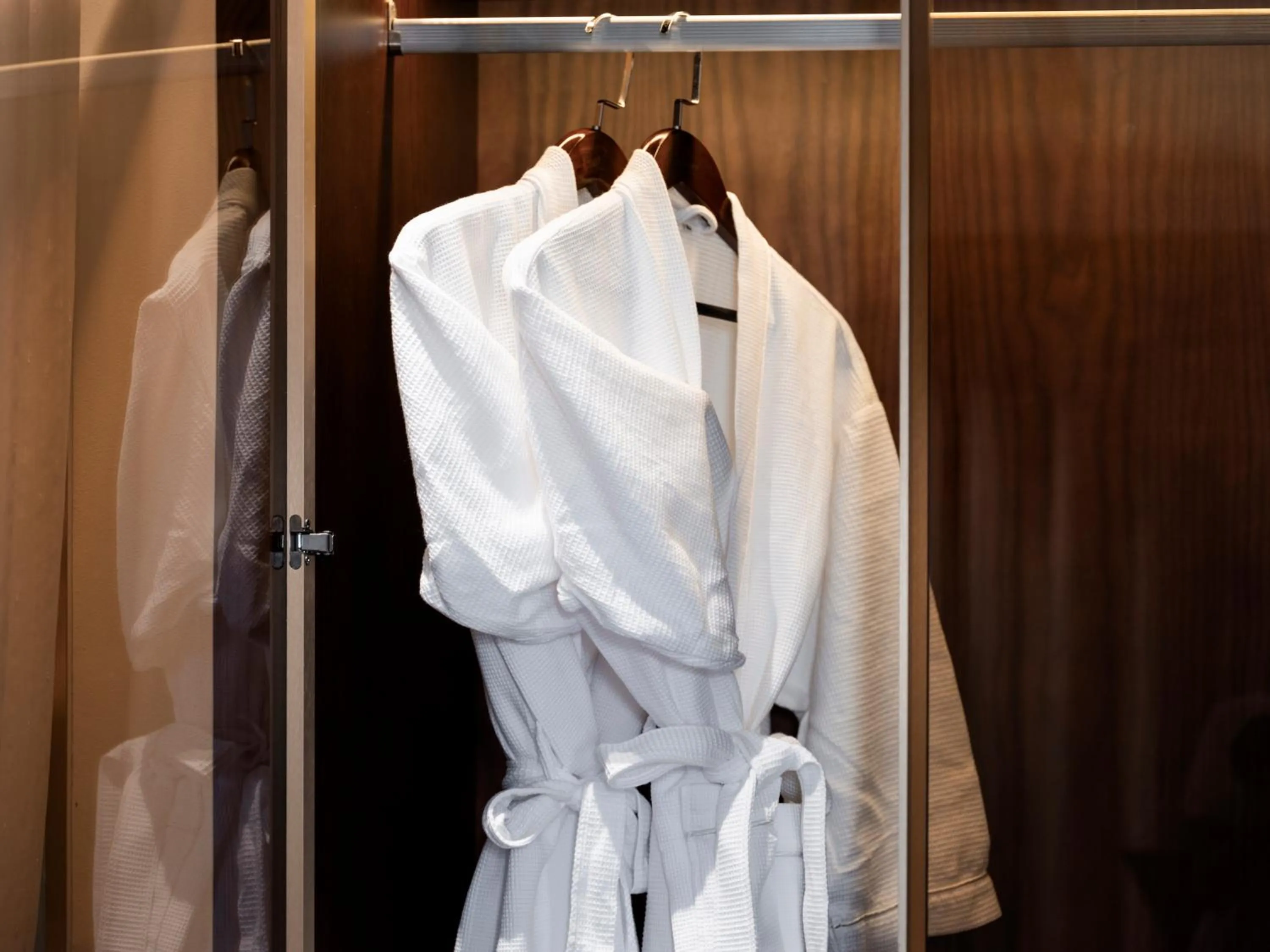wardrobe in L'Signature Hotel & Spa