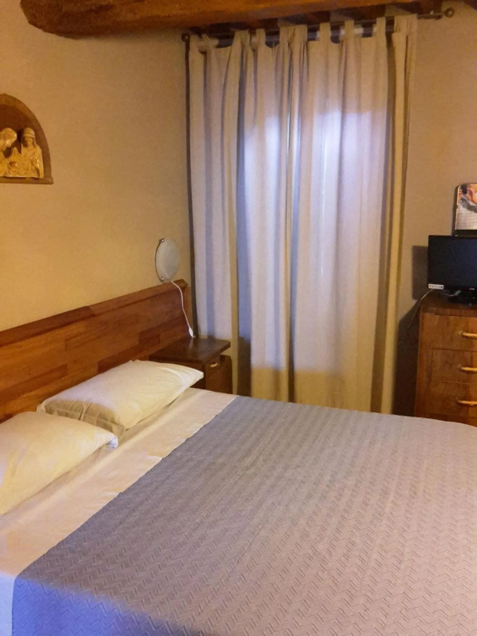 Photo of the whole room, Bed in Agriturismo Dosso al Porto