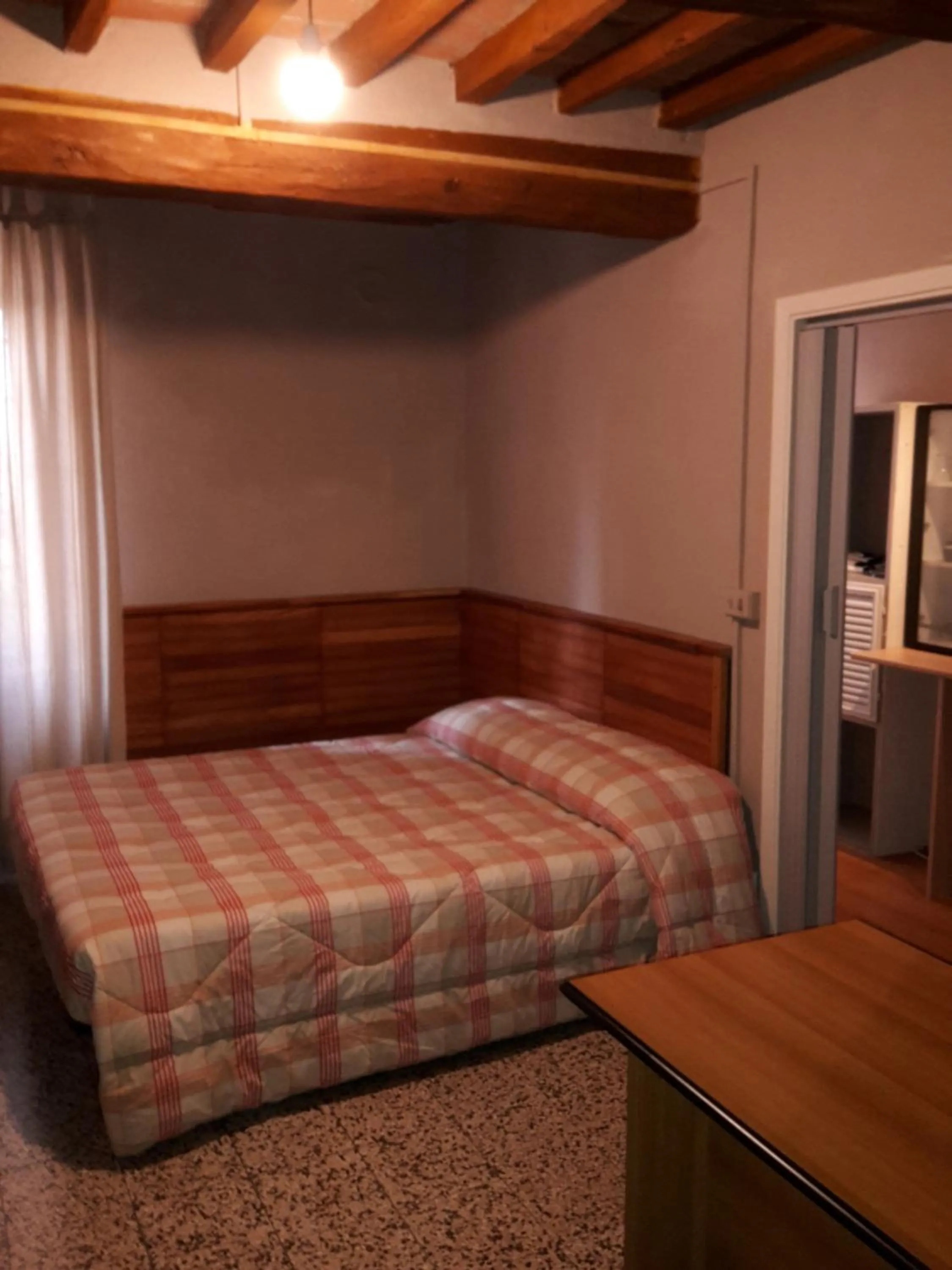 Photo of the whole room, Bed in Agriturismo Dosso al Porto