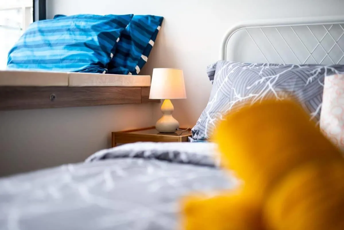 Bed in A Stylish 2BR Suite Water Views Free Parking