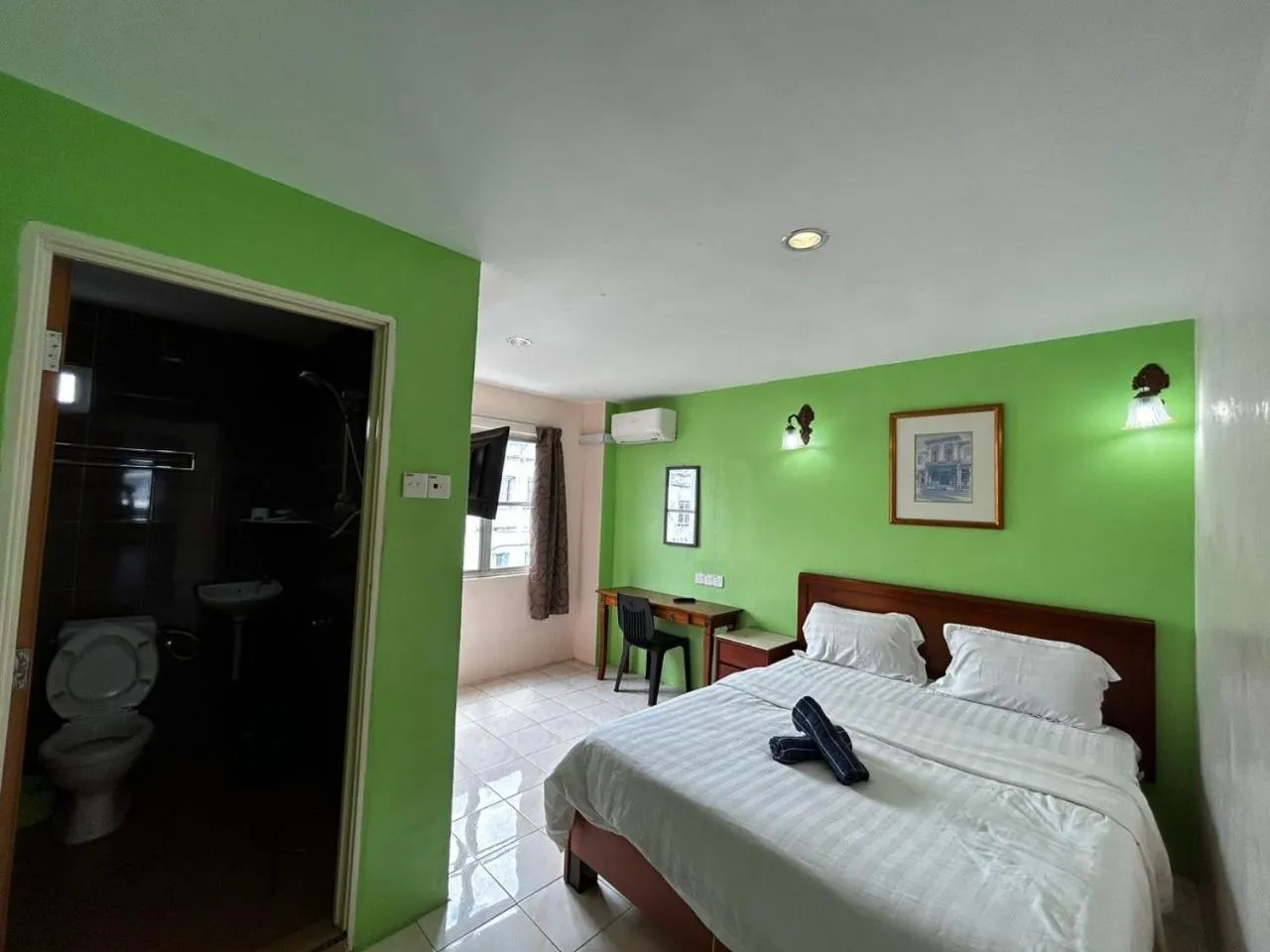 Bed in Hotel Harbour Stay