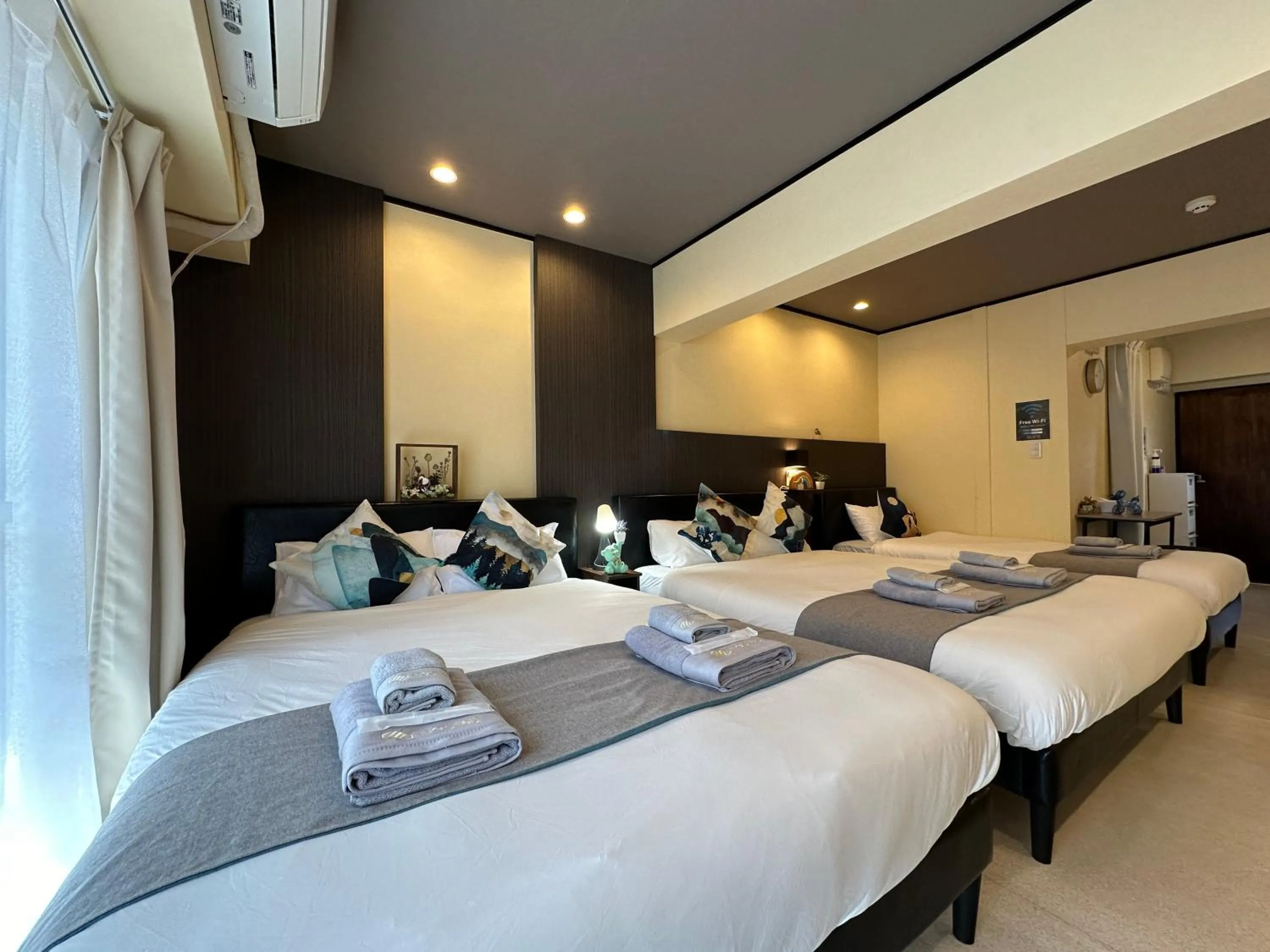 Bed in nestay apartment tokyo otsuka