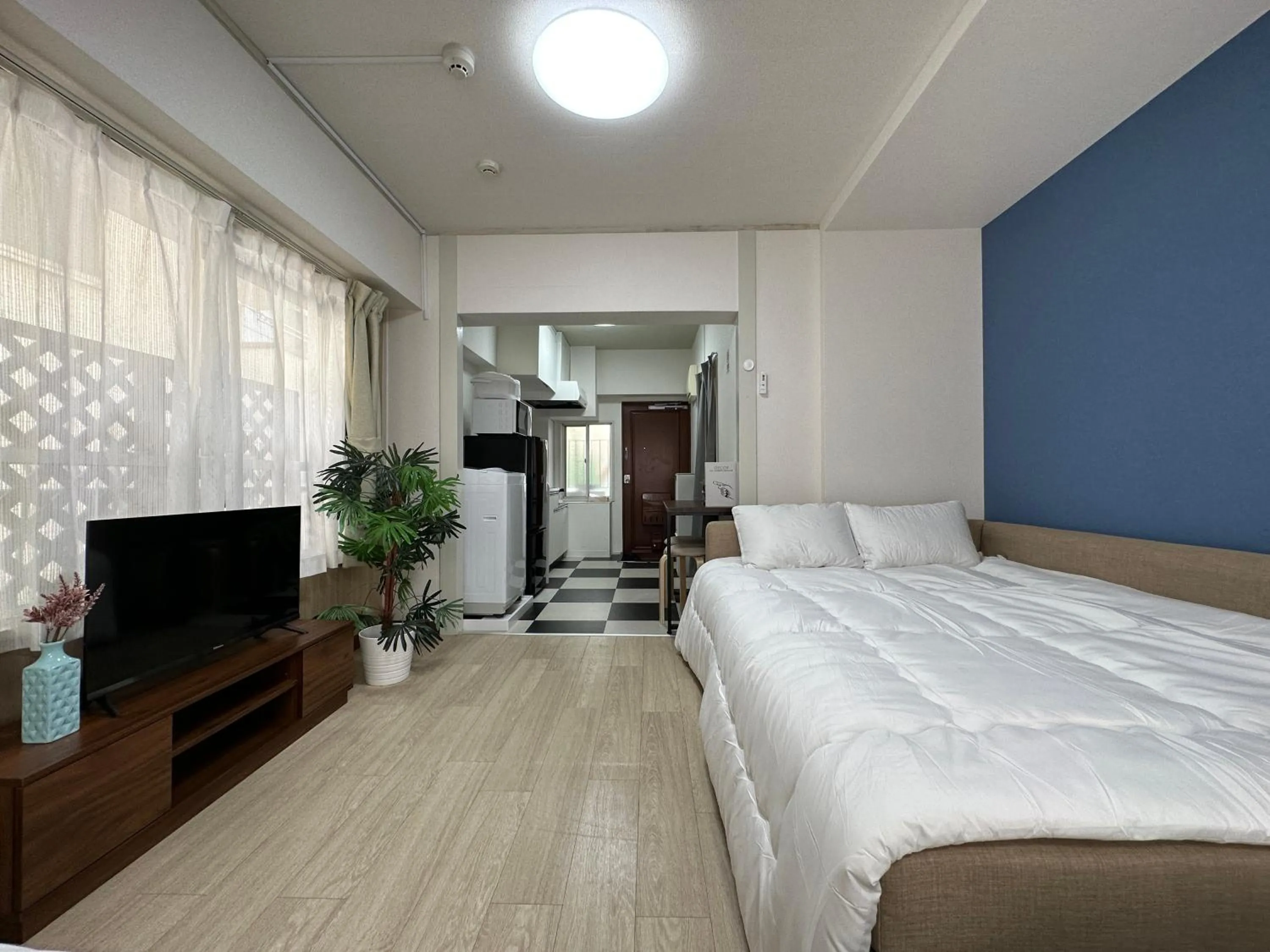 Bed in nestay apartment tokyo otsuka