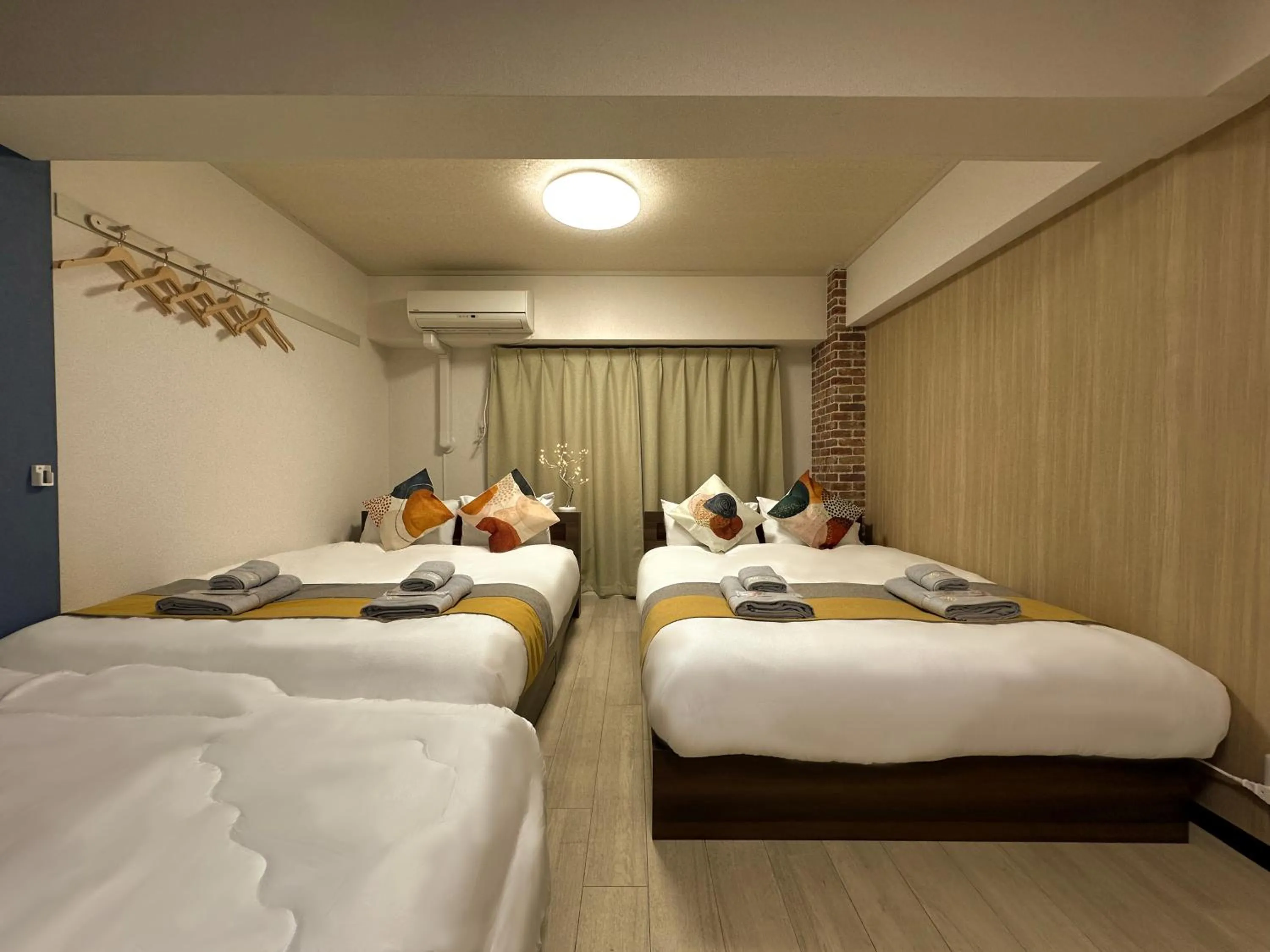 Bed in nestay apartment tokyo otsuka