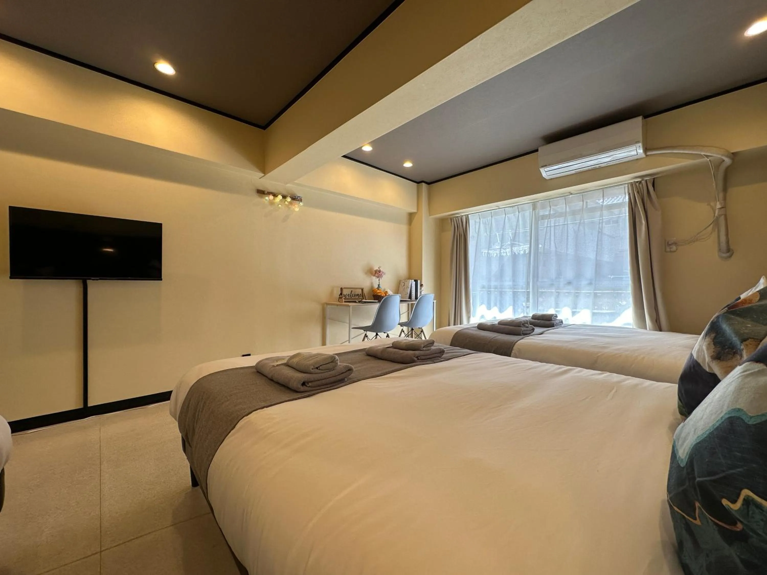 Bed in nestay apartment tokyo otsuka