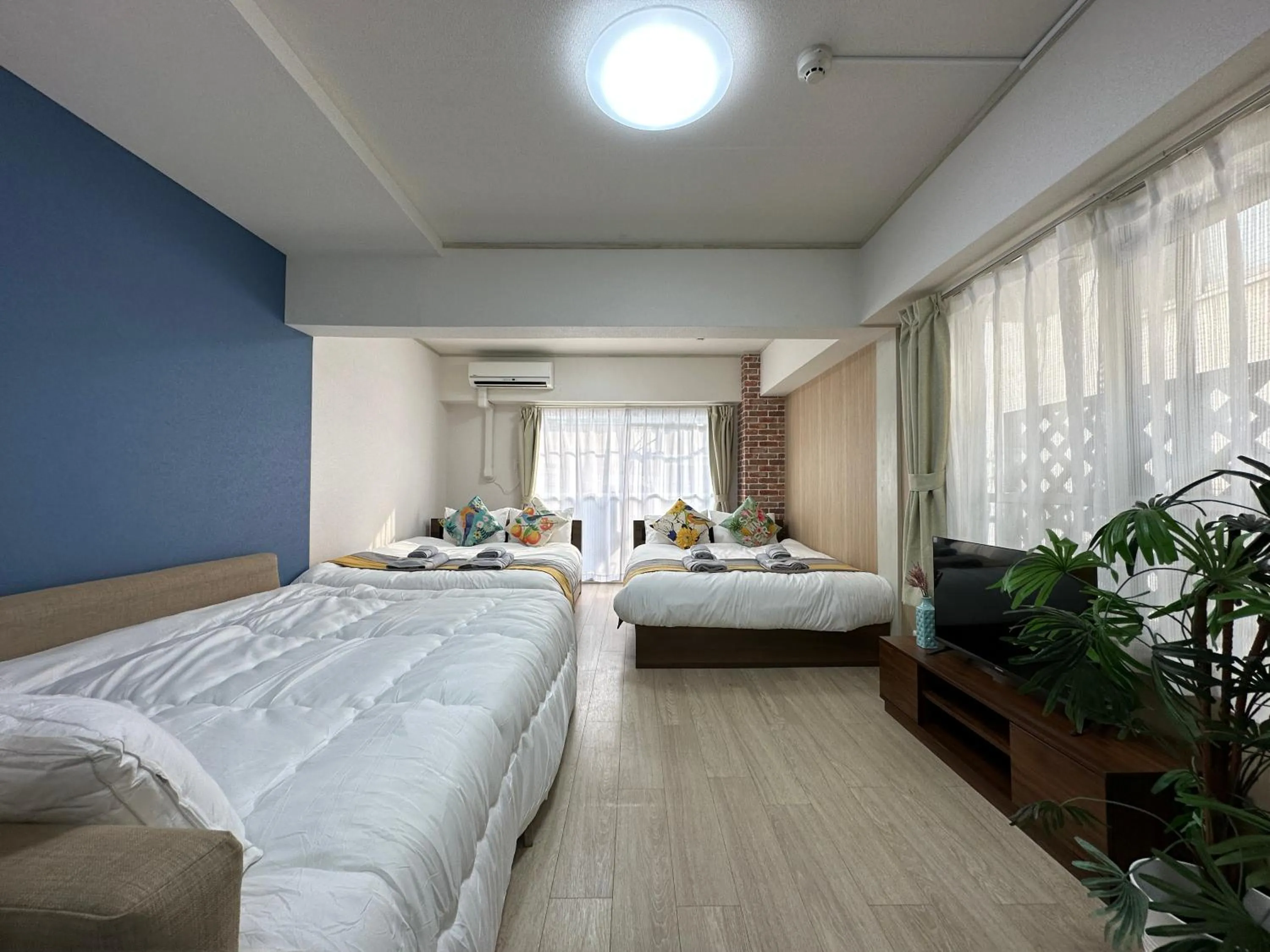 Bed in nestay apartment tokyo otsuka